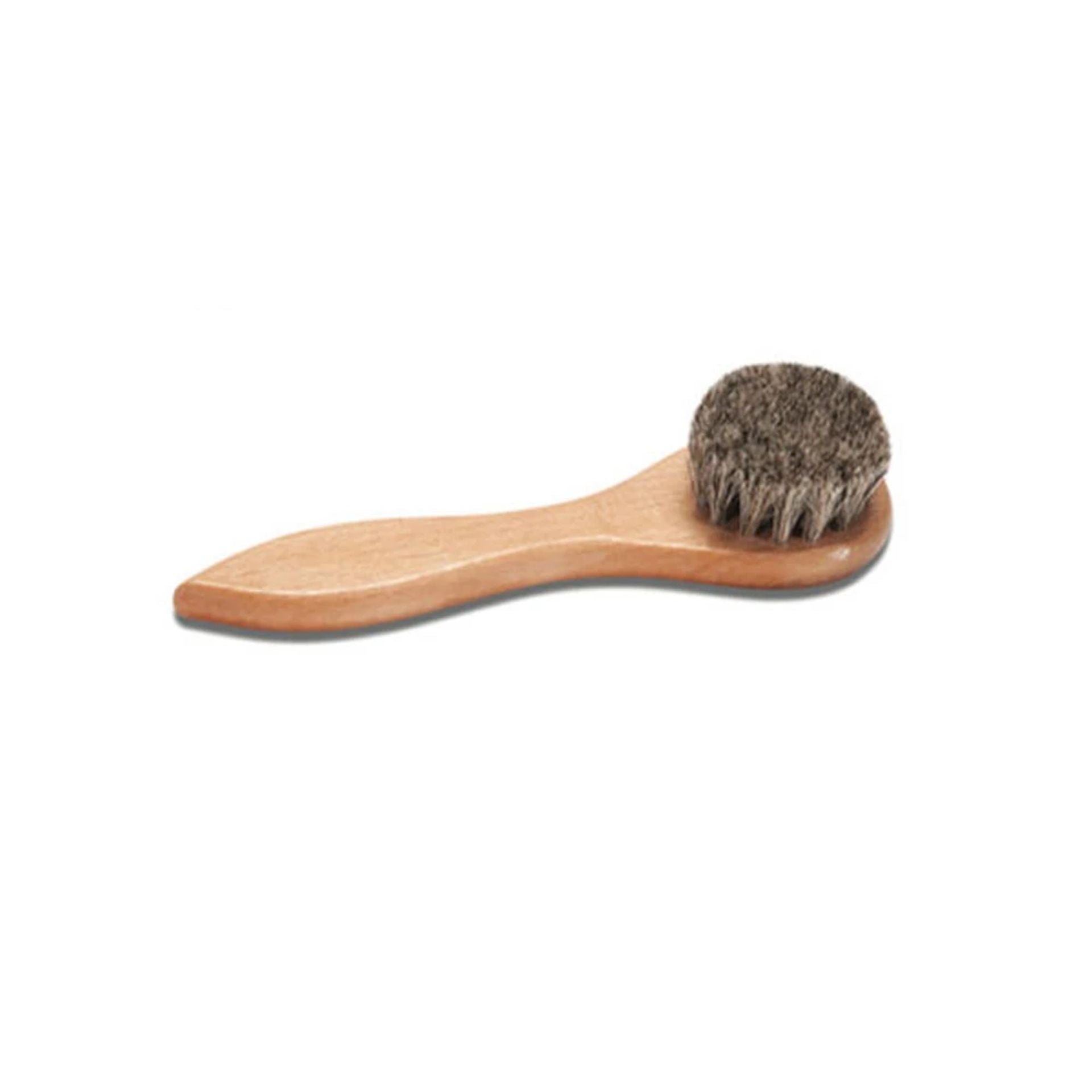 This is a New Era Wooden Cap Brush 1