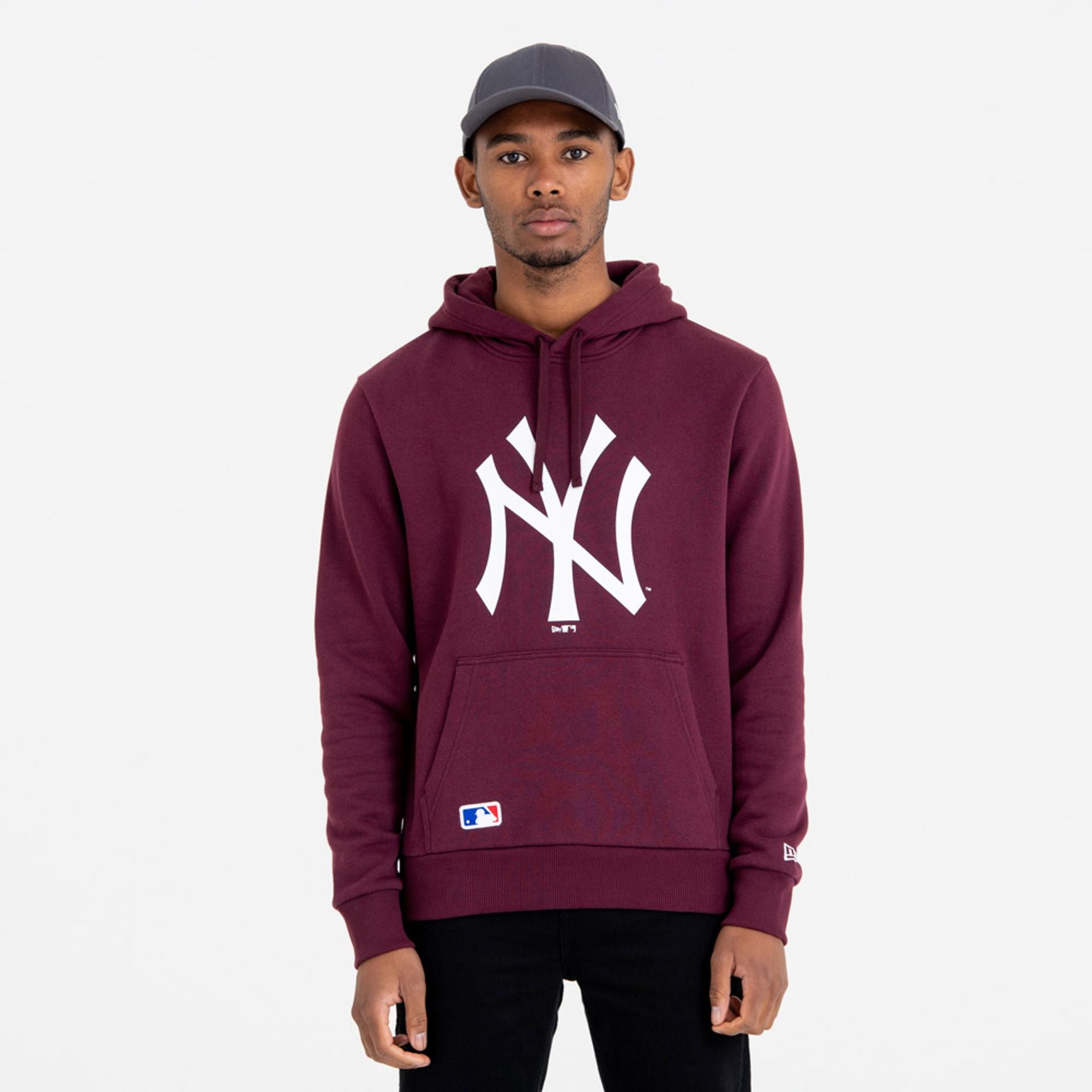 The Male model is wearing New York Yankees Team Logo Maroon Hoodie 1