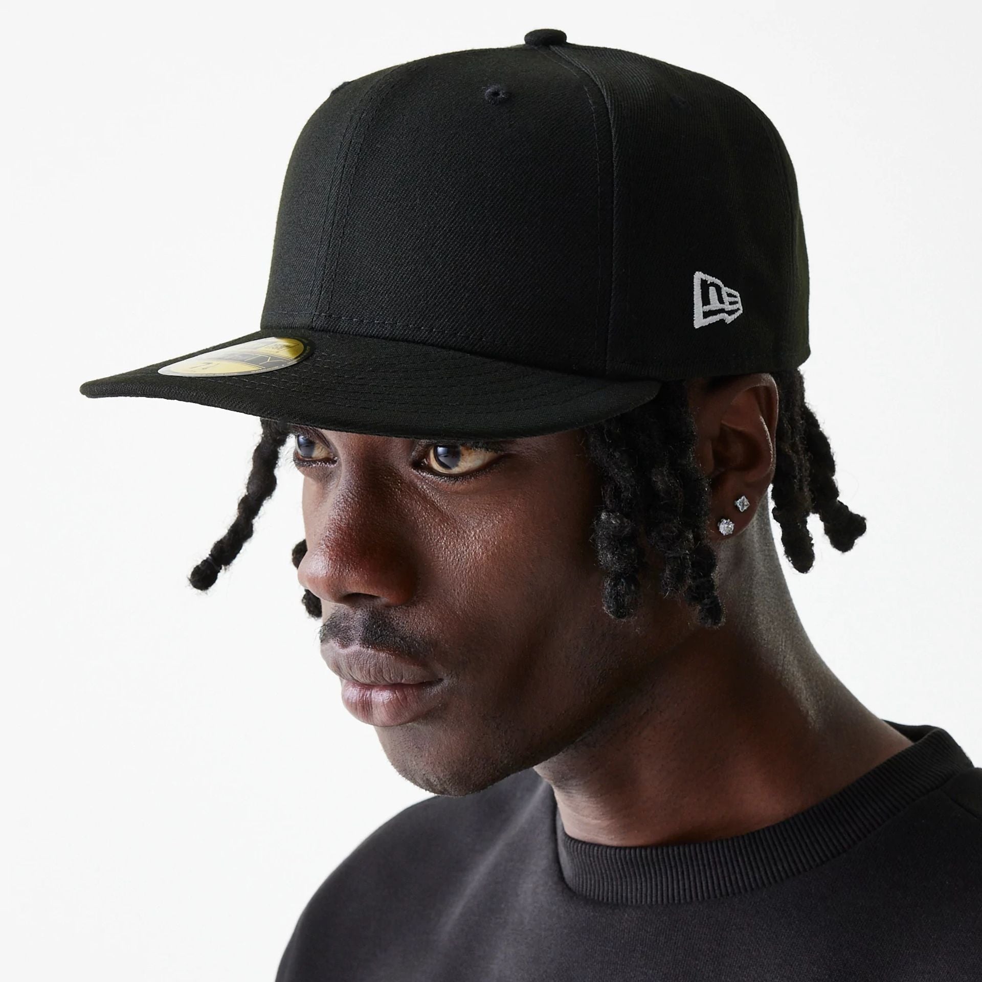 This is a New Era Essential Black 59FIFTY Cap 1