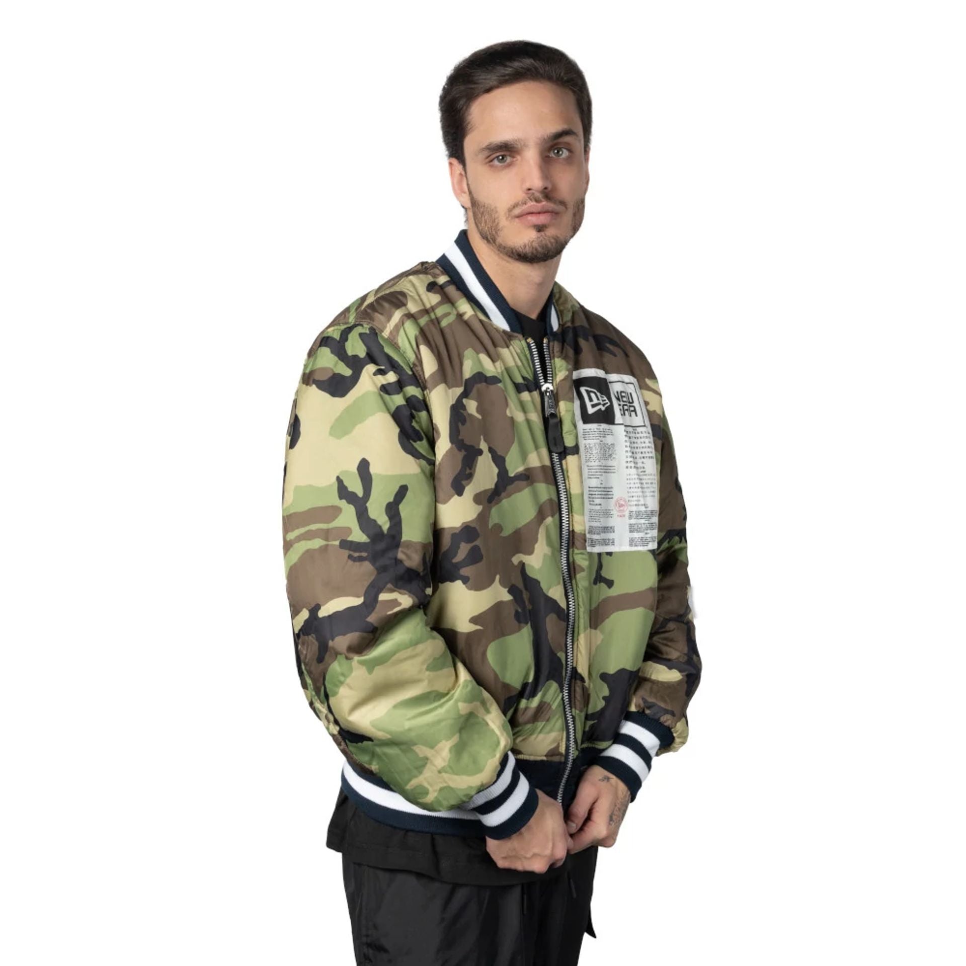 The Male model is wearing New York Yankees Alpha Industries Blue Reversible Bomber Jacket 6