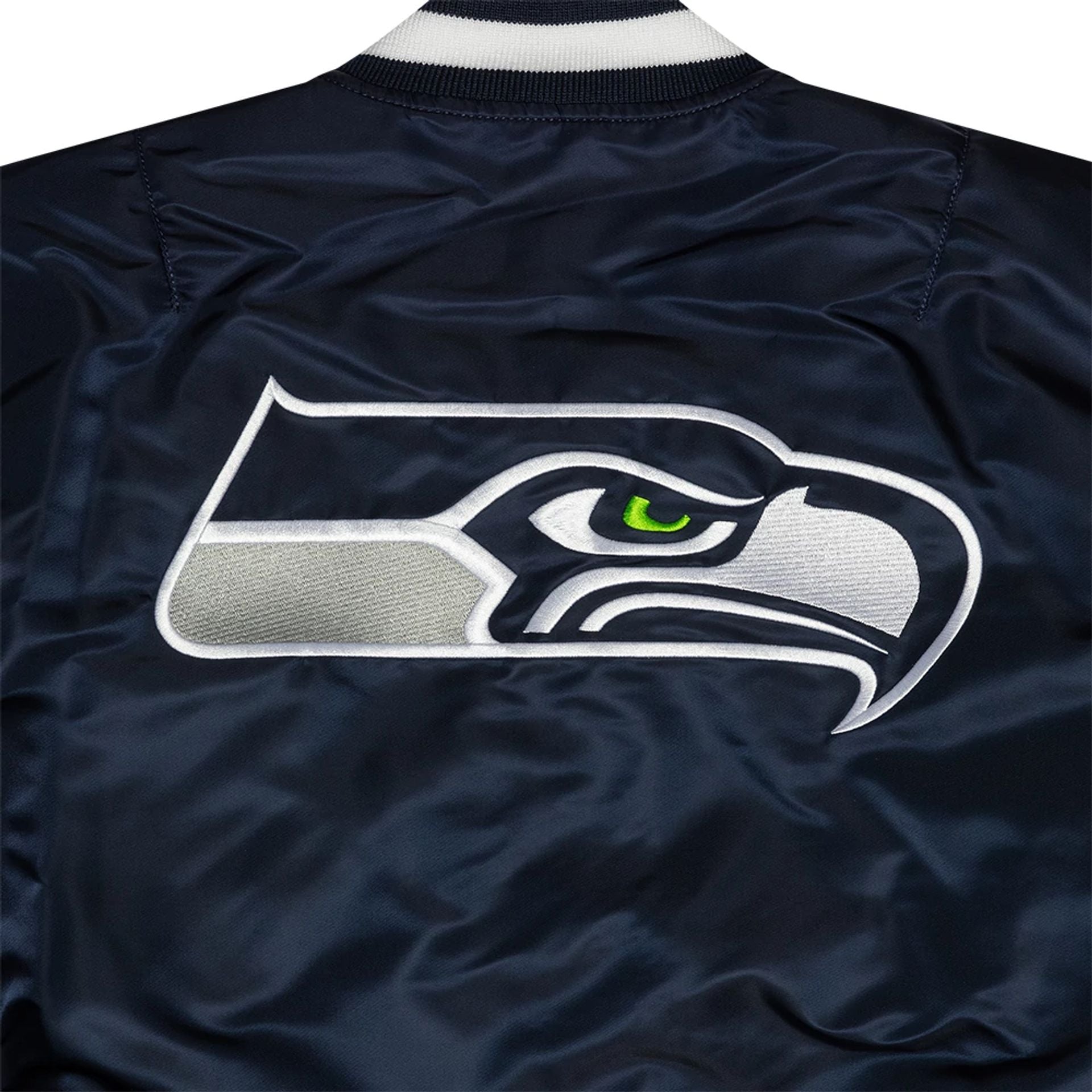 The Male model is wearing Seattle Seahawks x Alpha Industries Navy Reversible Bomber Jacket 3