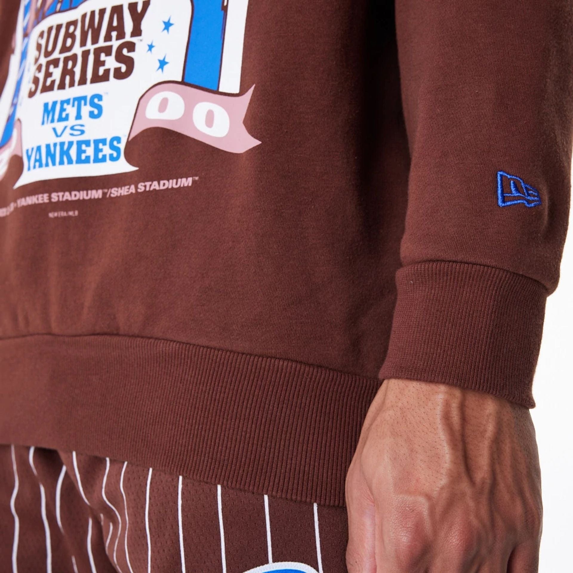 The Male model is wearing Subway Series New Era Australia Brown Oversized Sweater 4