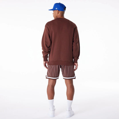 The Male model is wearing Subway Series New Era Australia Brown Oversized Sweater 6