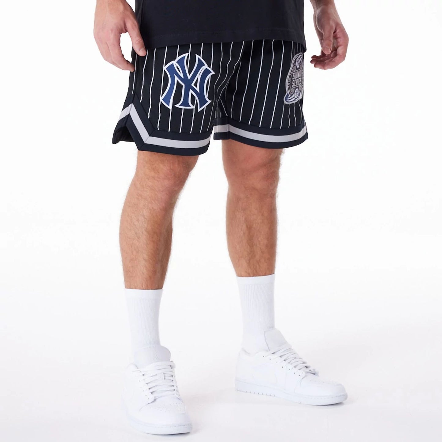 The Male model is wearing New York Yankees Pinstripe New Era Australia Black Shorts 8