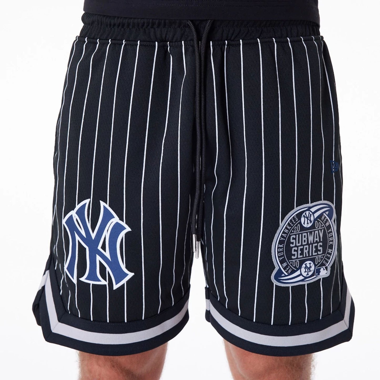 The Male model is wearing New York Yankees Pinstripe New Era Australia Black Shorts 7