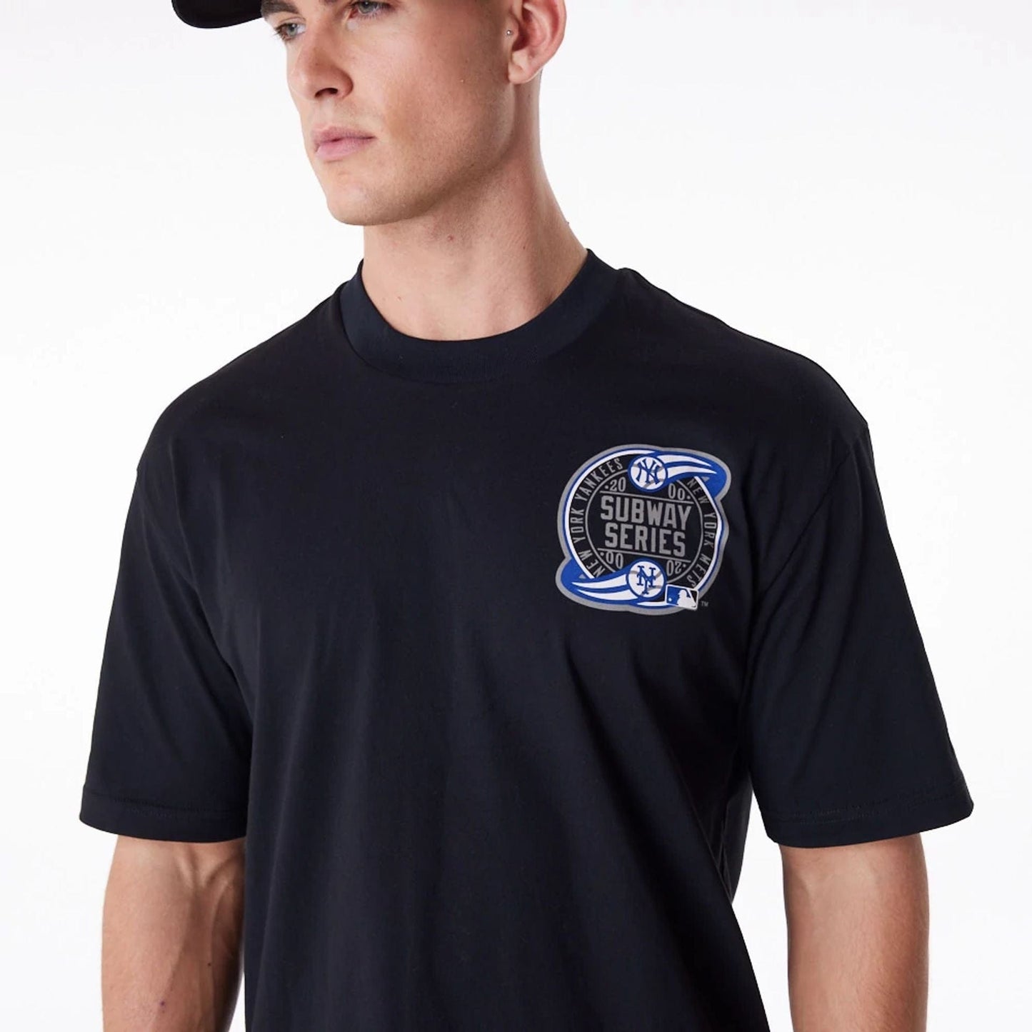 The Male model is wearing New York Yankees New Era Australia Black Oversized T-Shirt 5