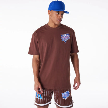 The Male model is wearing Subway Series New Era Australia Brown Oversized T-Shirt 1