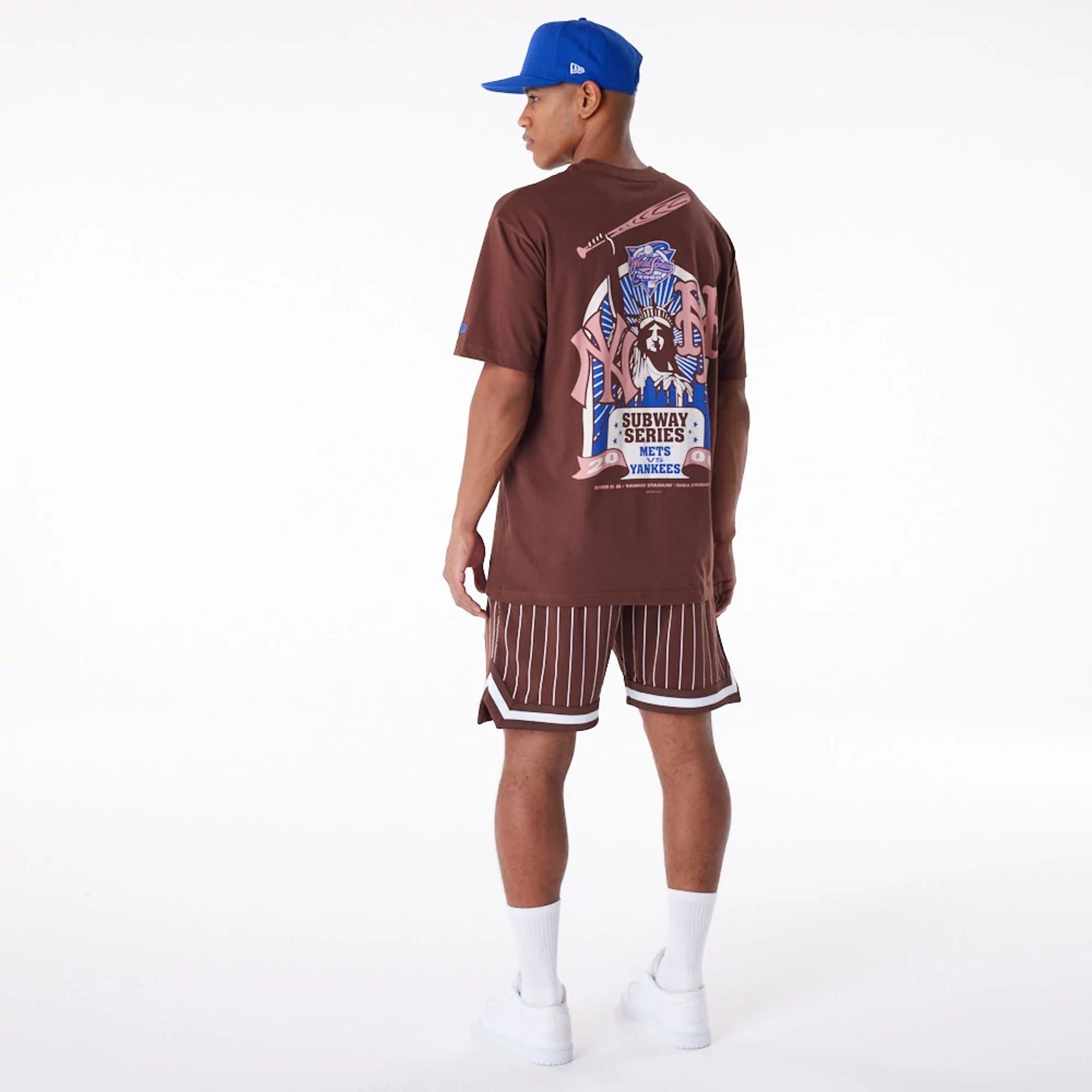 The Male model is wearing Subway Series New Era Australia Brown Oversized T-Shirt 4