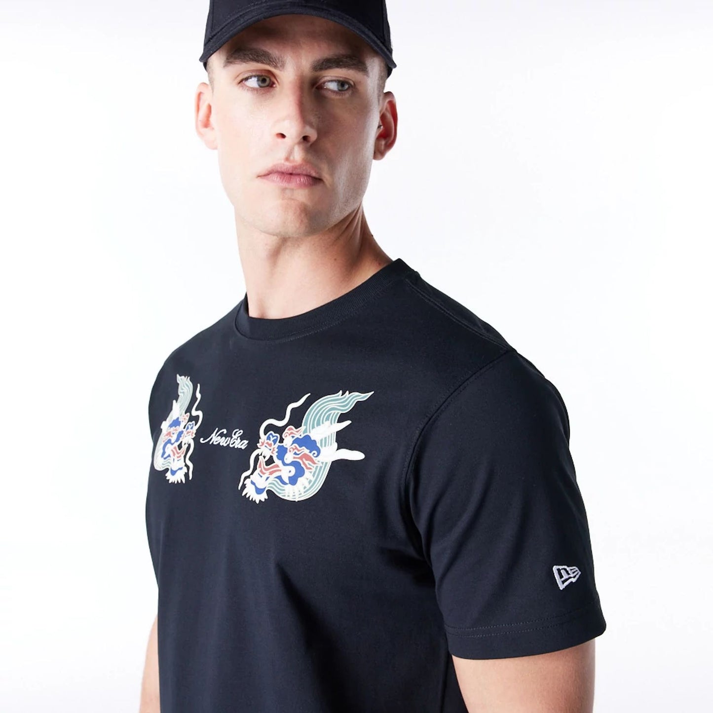 The Male model is wearing New Era Year Of The Dragon Black T-Shirt 5