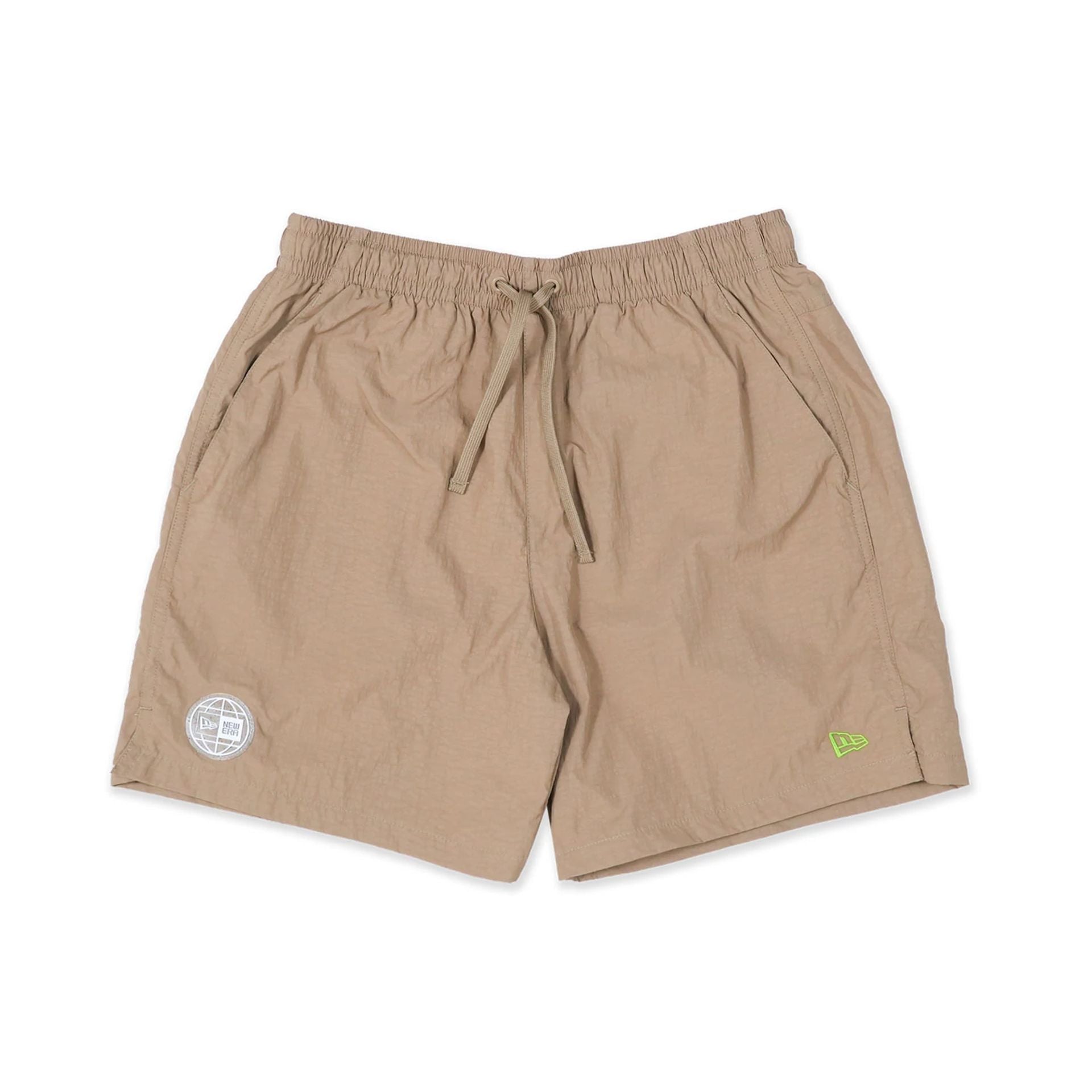 The Male model is wearing New Era Earth Day Beige Shorts 1