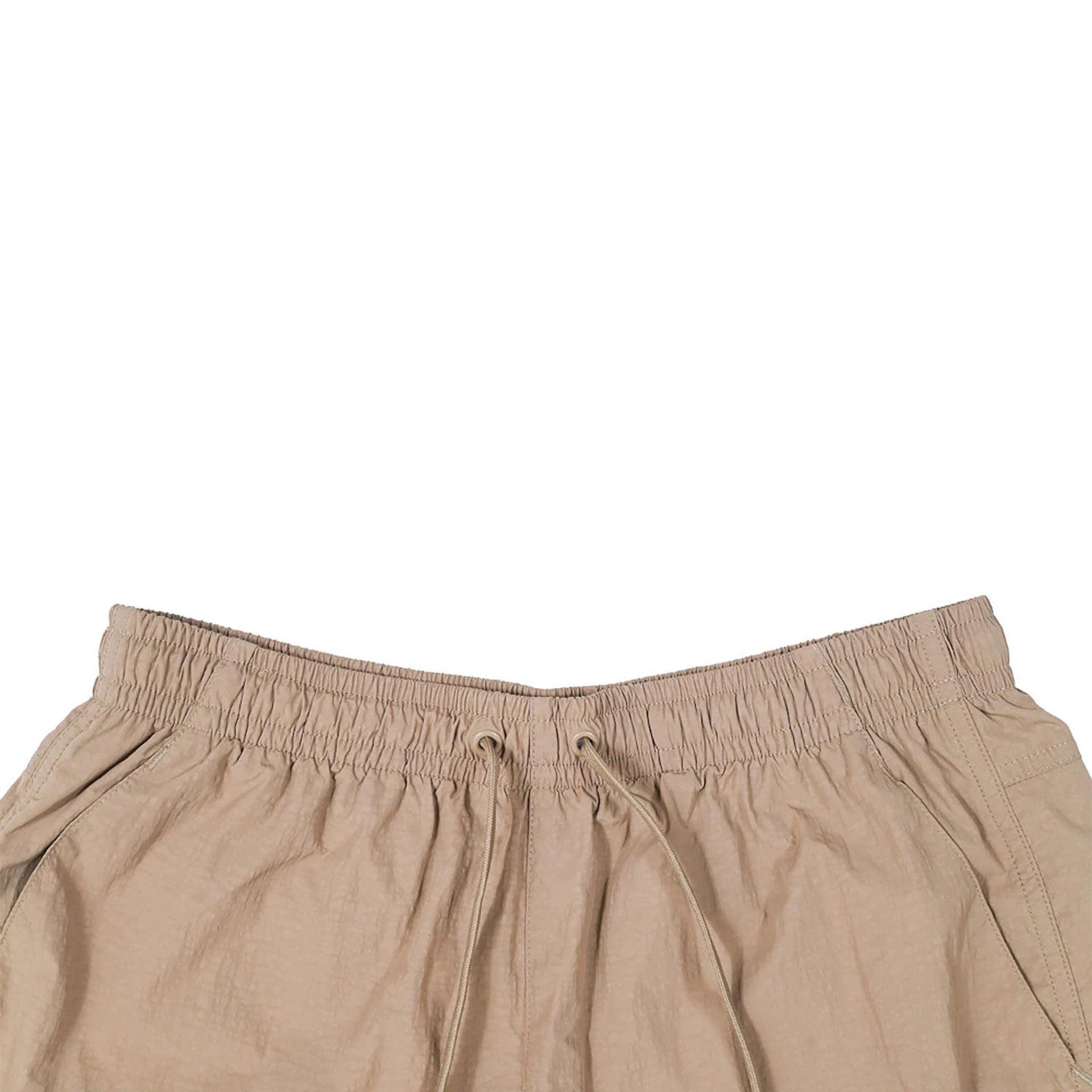 The Male model is wearing New Era Earth Day Beige Shorts 6