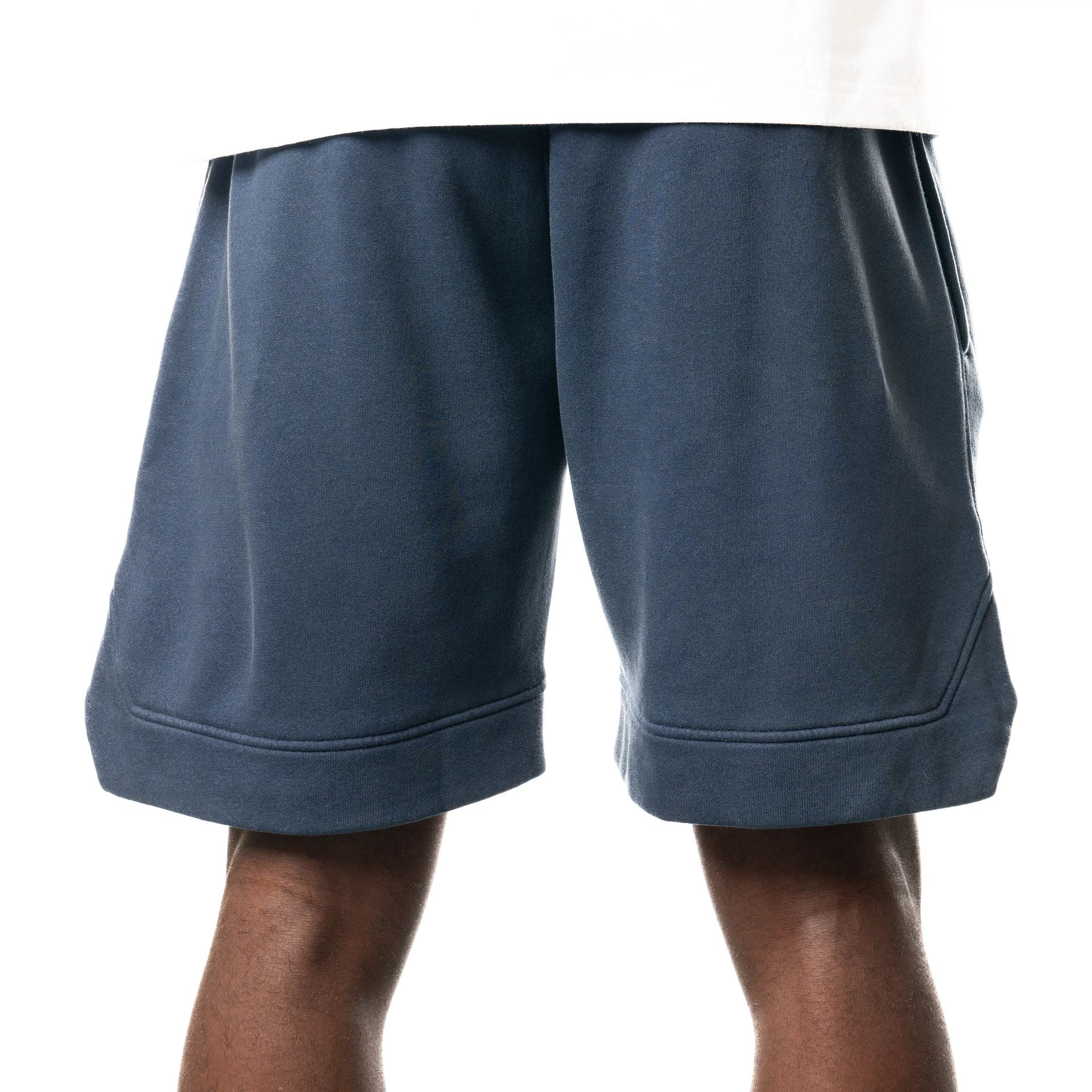 The Male model is wearing New York Yankees New Era Australia Dark Blue Fleece Shorts  2