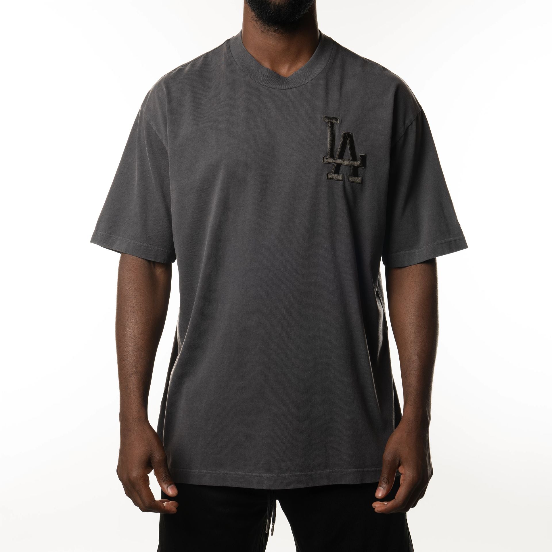 The Male model is wearing LA Dodgers New Era Australia Charcoal Oversized T-Shirt  1