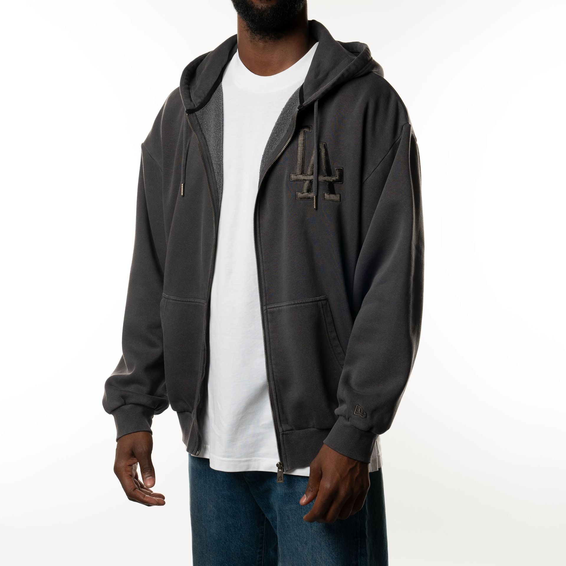 The Male model is wearing LA Dodgers New Era Australia Charcoal Oversized Full Zip Hoodie  1