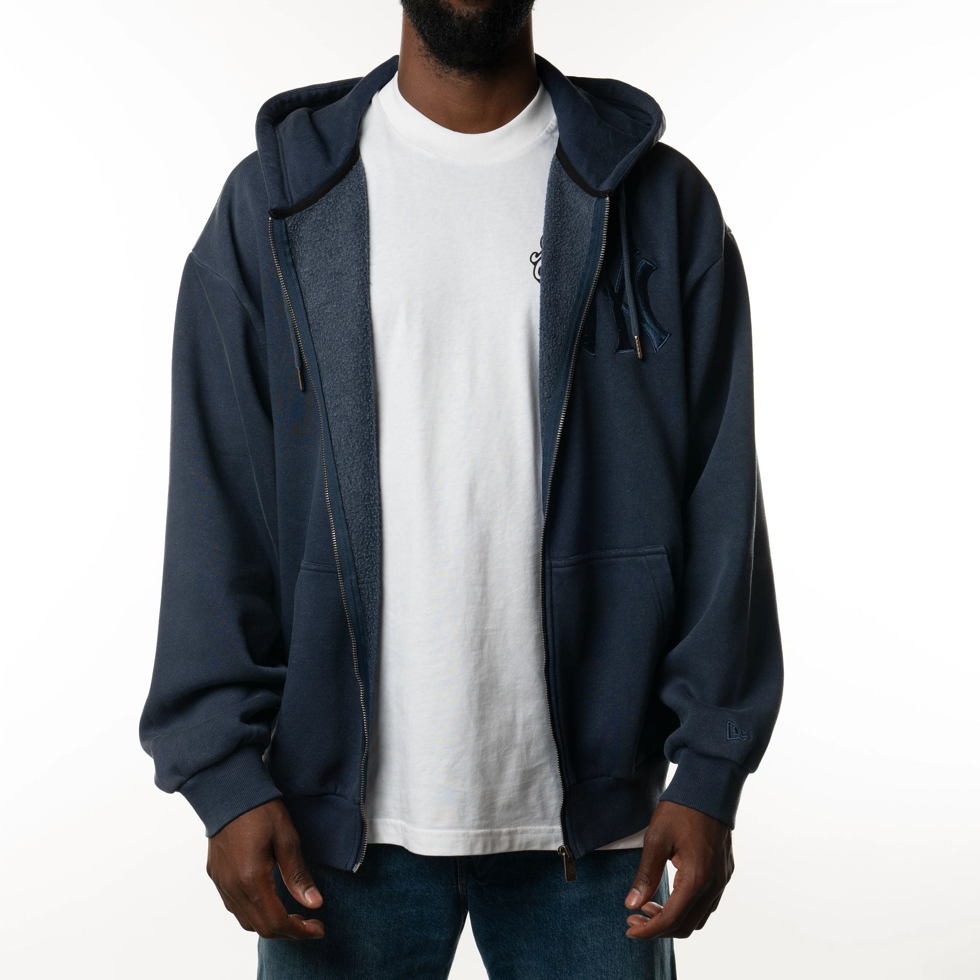 The Male model is wearing New York Yankees New Era Australia Dark Blue Oversized Full Zip Hoodie  5