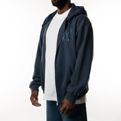 The Male model is wearing New York Yankees New Era Australia Dark Blue Oversized Full Zip Hoodie  6