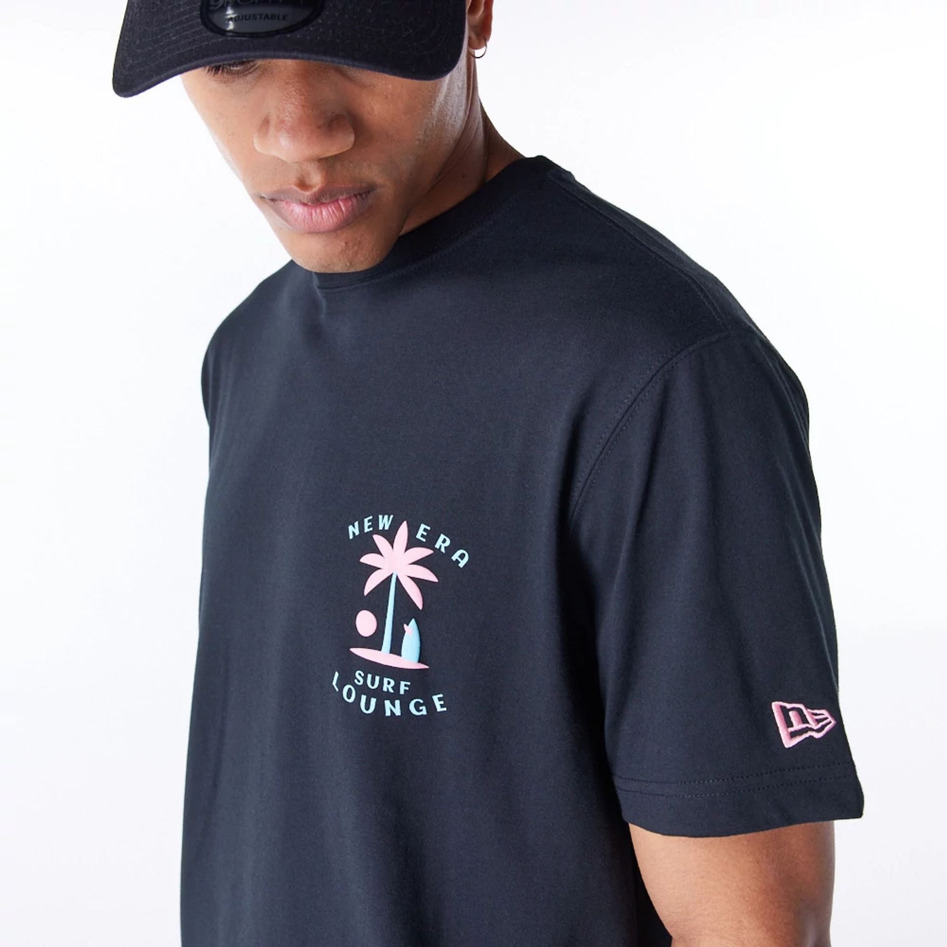 The Male model is wearing New Era Korea Surf Lounge Black T-Shirt 7