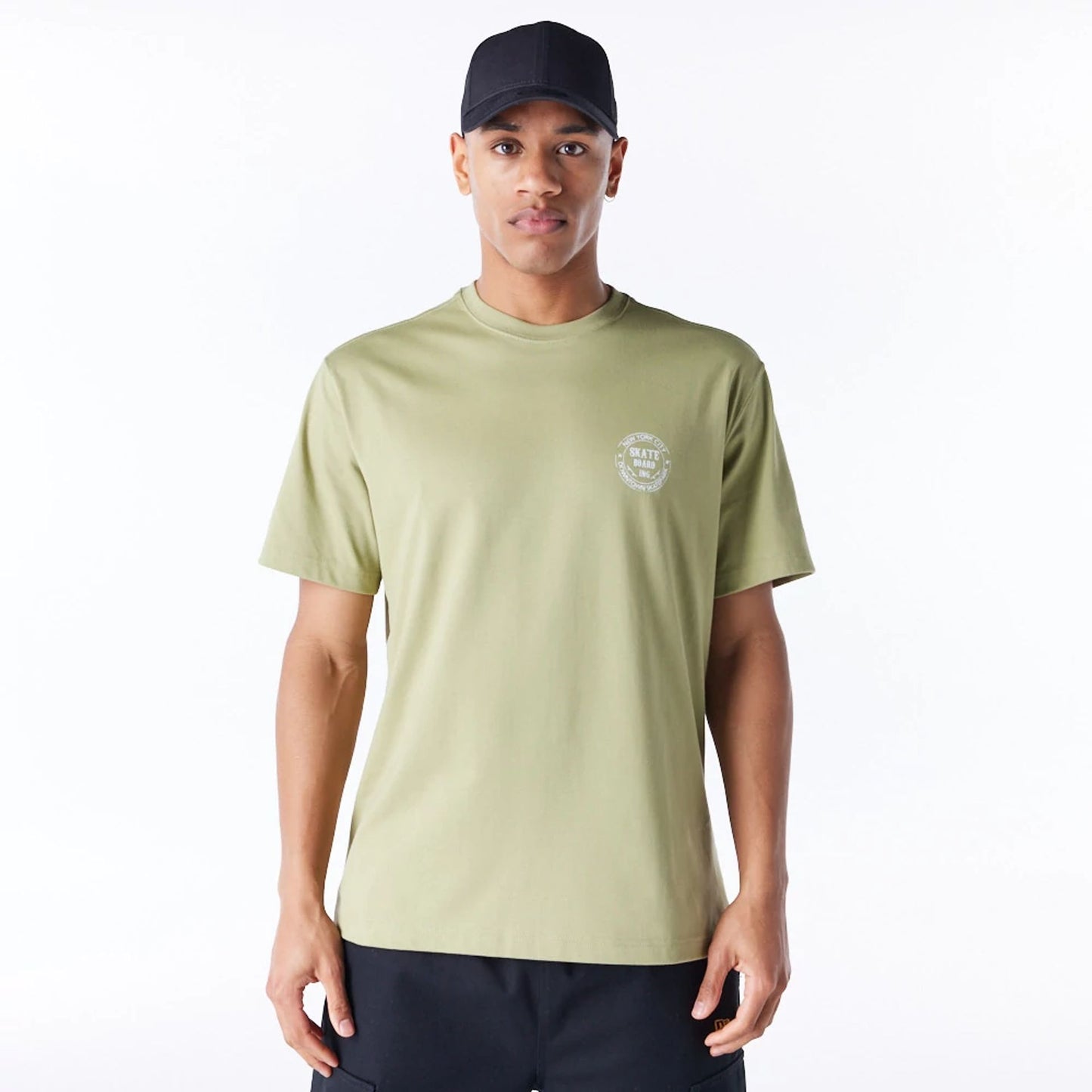 The Male model is wearing New Era Korea Skateboard Green T-Shirt 2