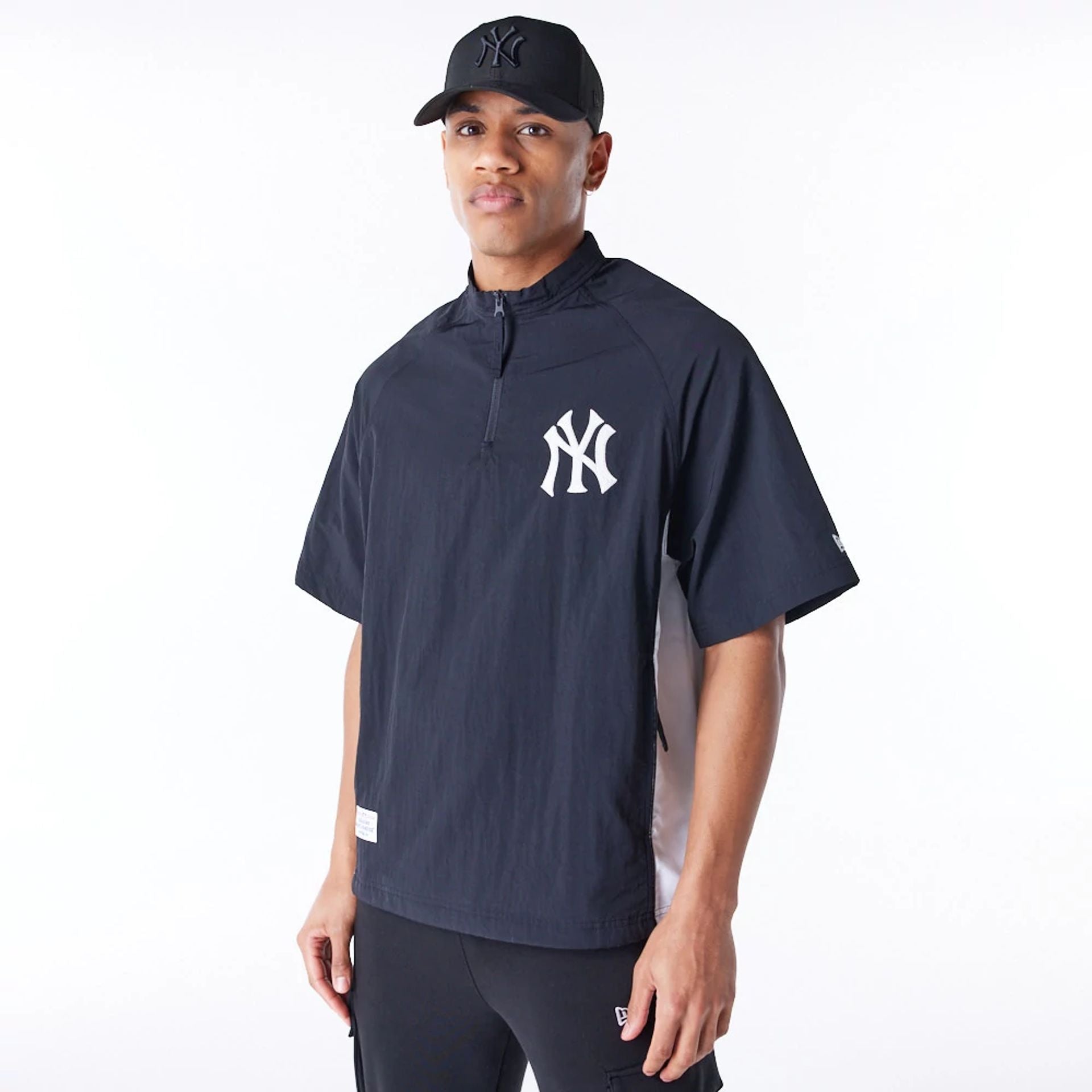 The Male model is wearing New Era Korea MLB New York Yankees Black Short Sleeve Anorak 6