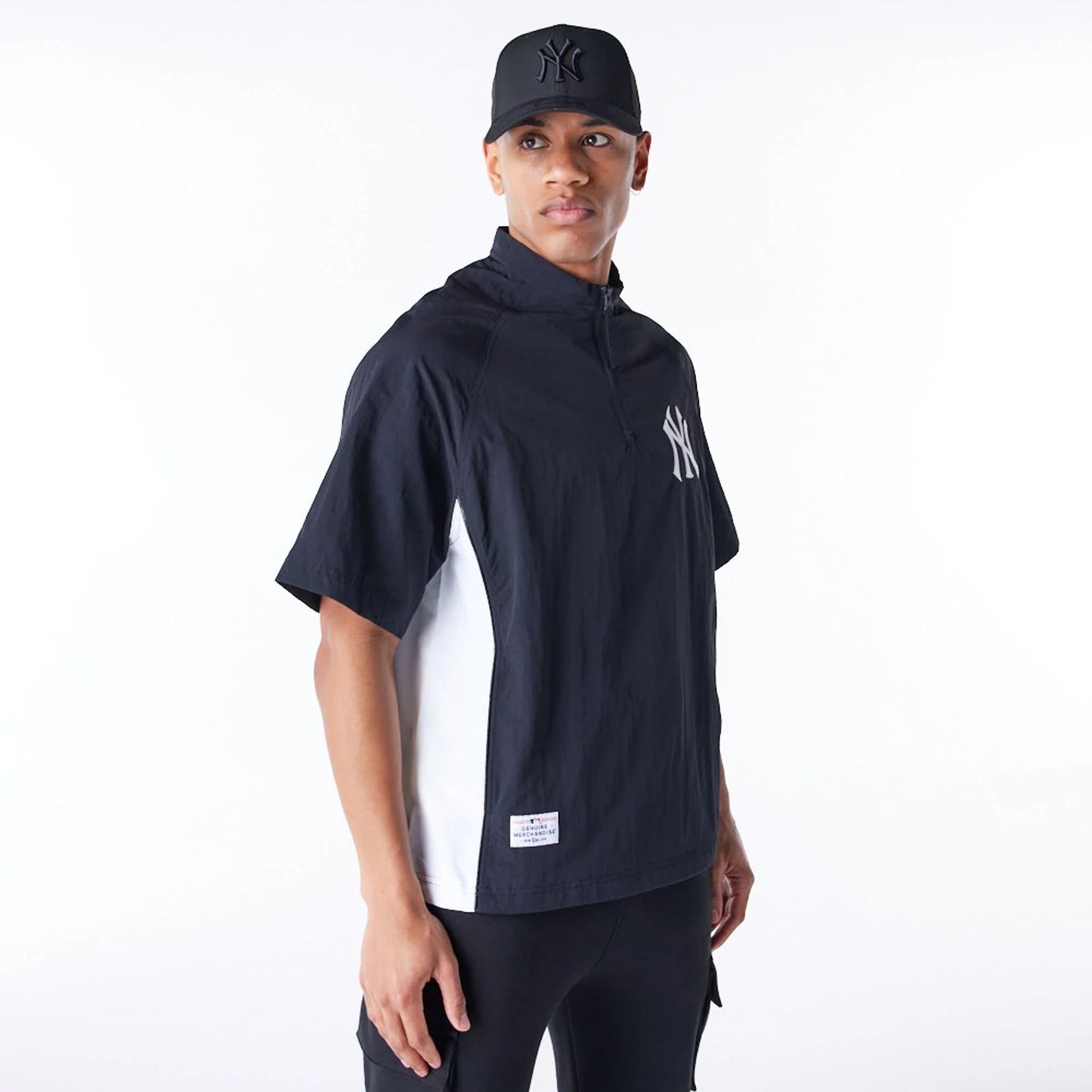 The Male model is wearing New Era Korea MLB New York Yankees Black Short Sleeve Anorak 3