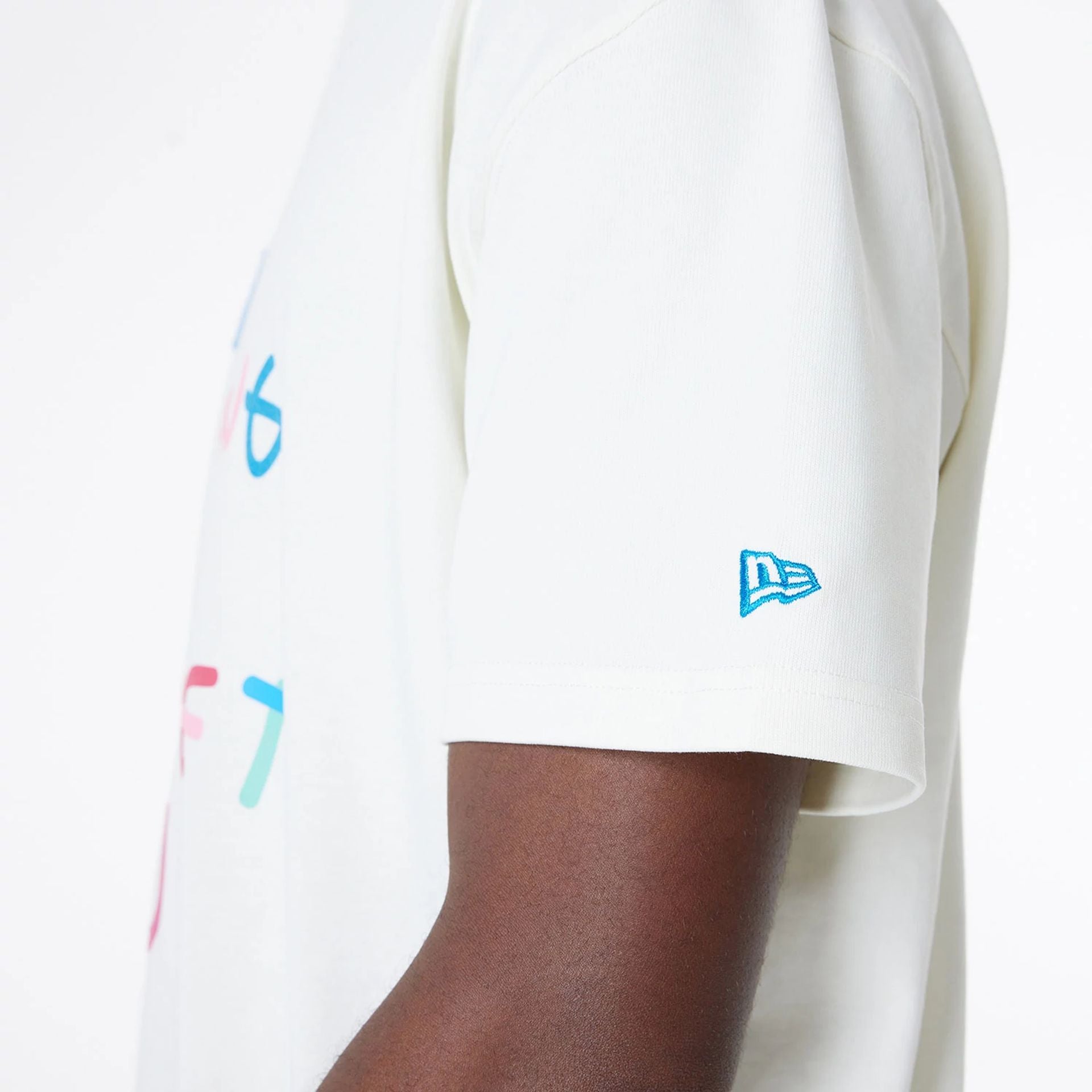 The Male model is wearing Ricardo Luévanos x New Era White T-Shirt 4