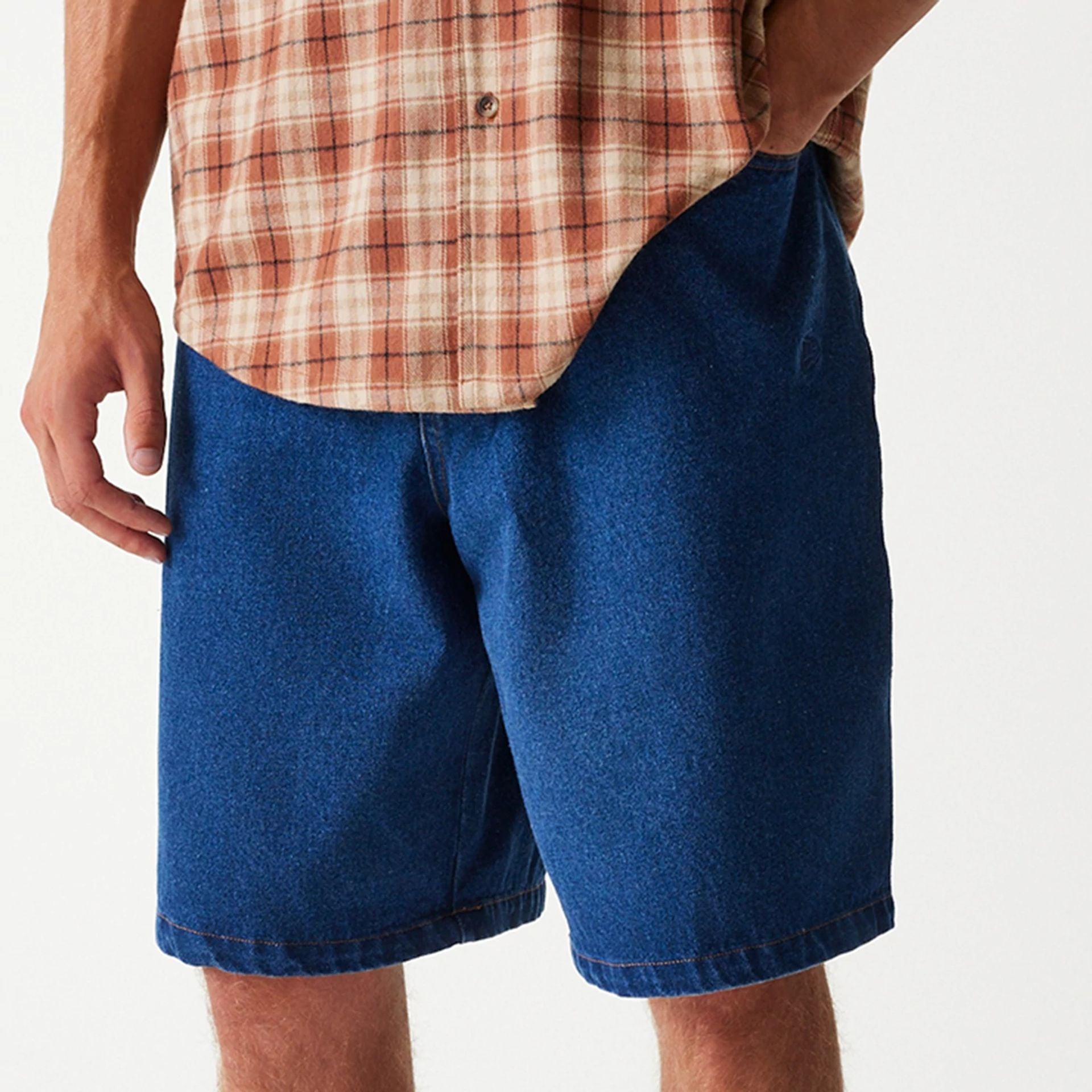 The Male model is wearing New York Yankees Dark Blue Denim Shorts 3