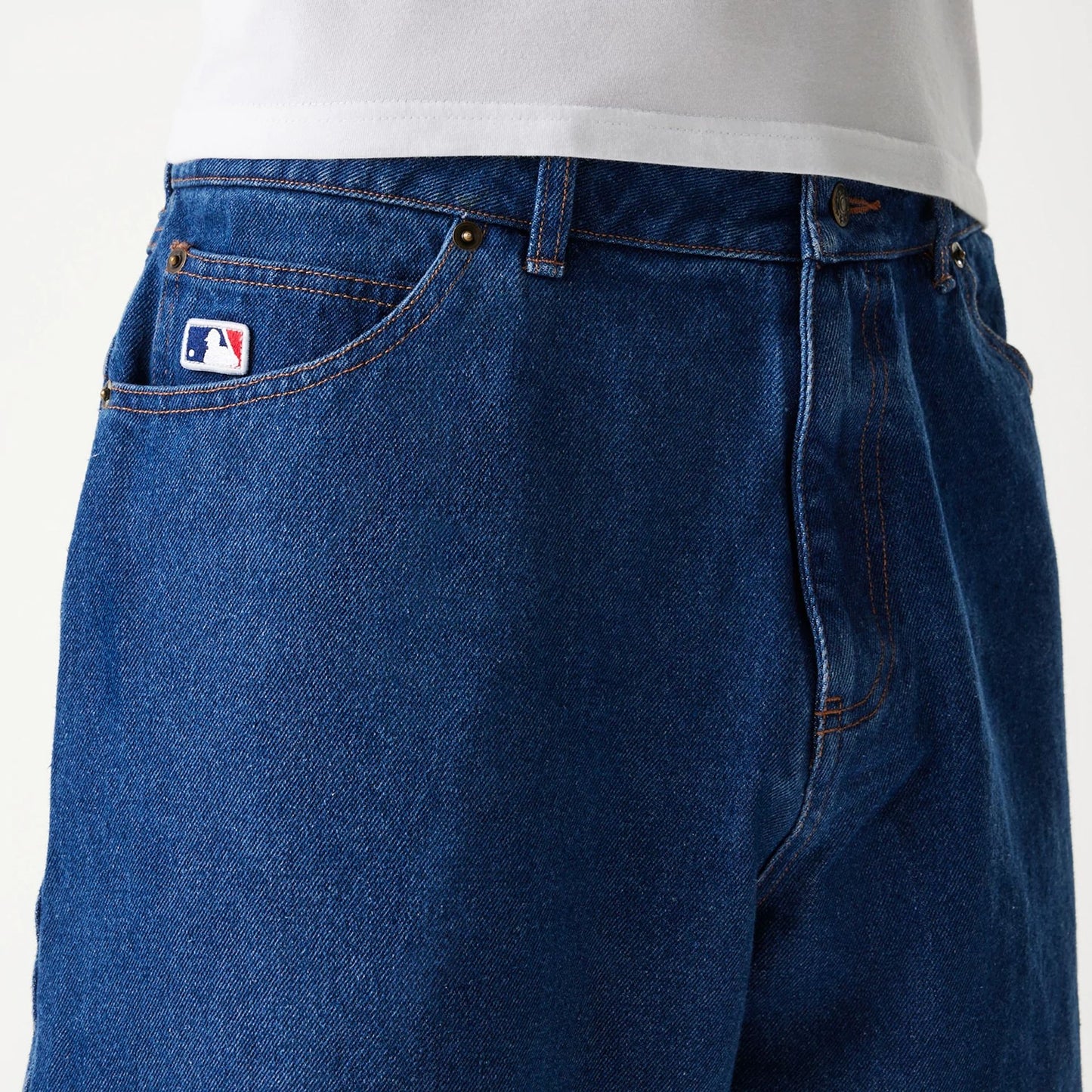 The Male model is wearing New York Yankees Dark Blue Denim Shorts 4