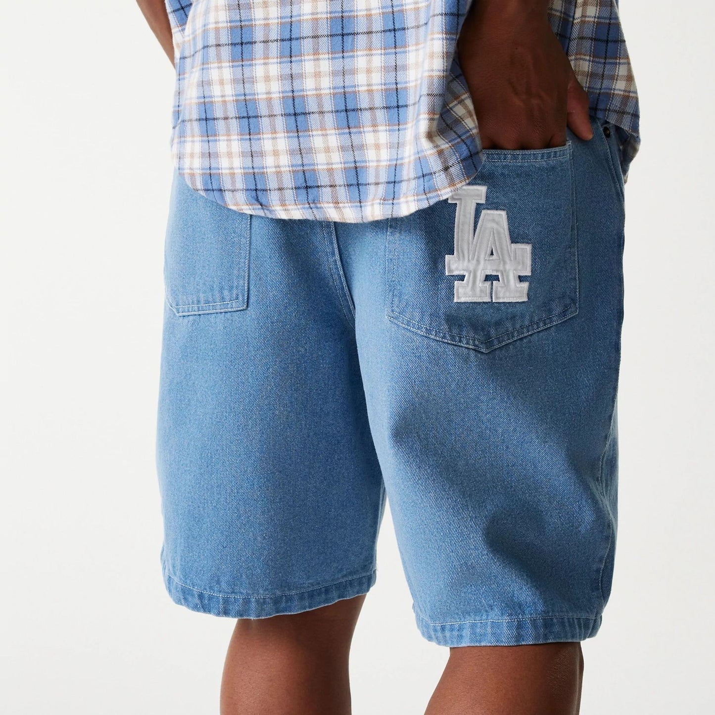 The Male model is wearing LA Dodgers Light Blue Denim Shorts 2