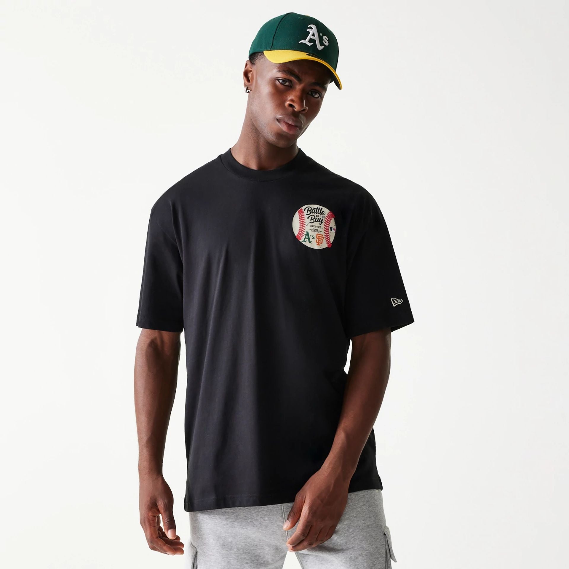 The Male model is wearing MLB Multi Team Battle Of The Bay Black Oversized T-Shirt 1