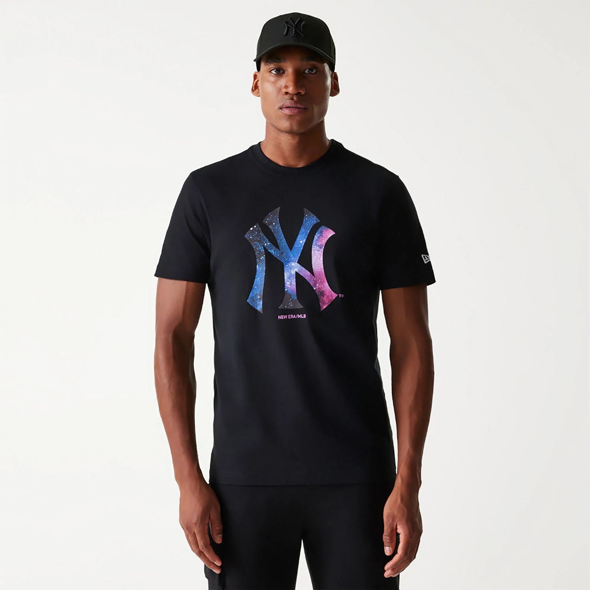 The Male model is wearing New York Yankees Cosmic Space Black T-Shirt 1