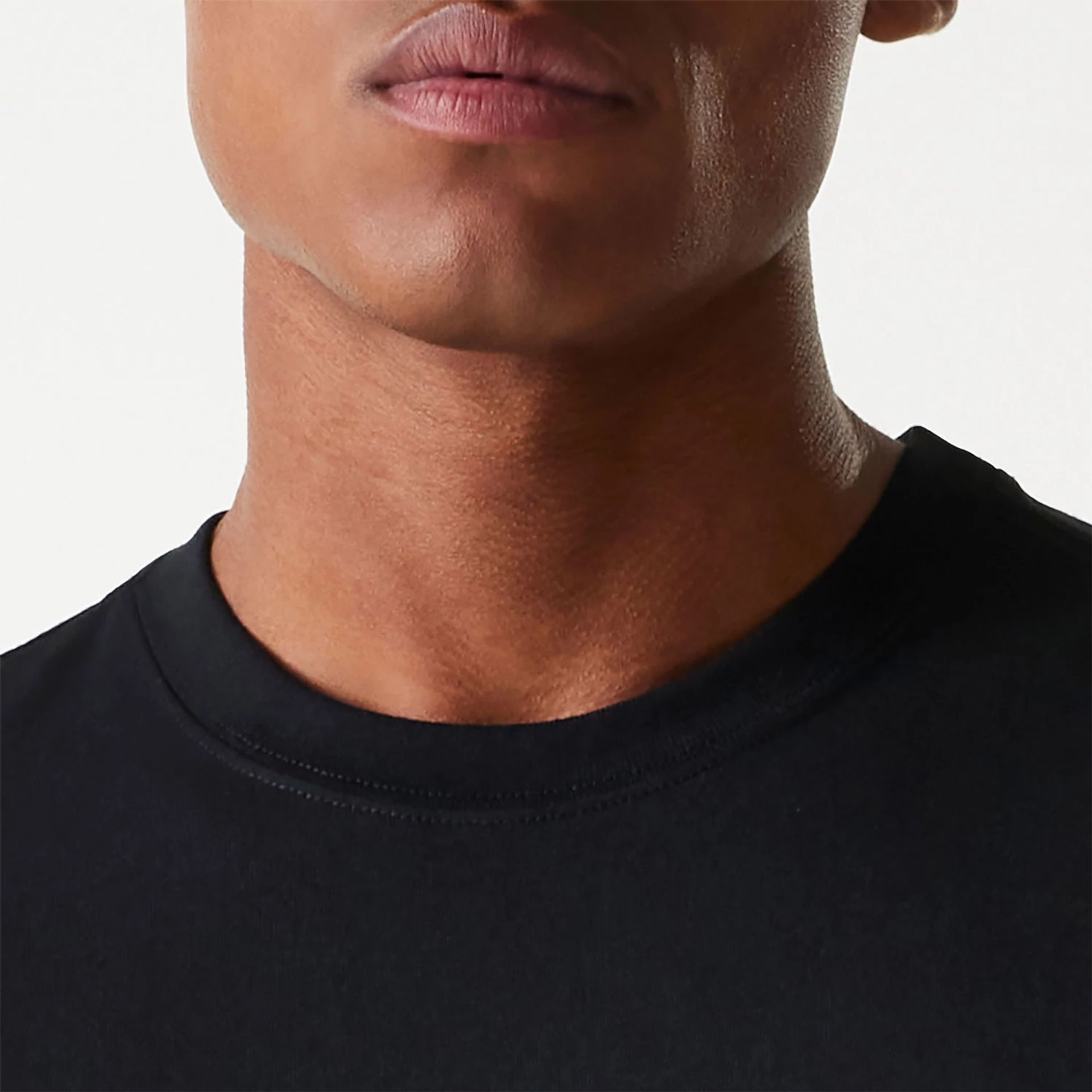 The Male model is wearing New York Yankees Cosmic Space Black T-Shirt 6