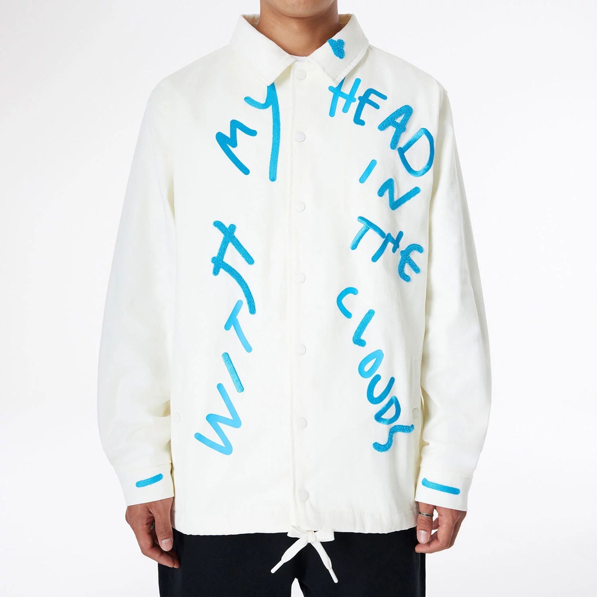 The Male model is wearing Ricardo Luévanos x New Era White Coach Jacket 3