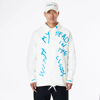 The Male model is wearing Ricardo Luévanos x New Era White Coach Jacket 1