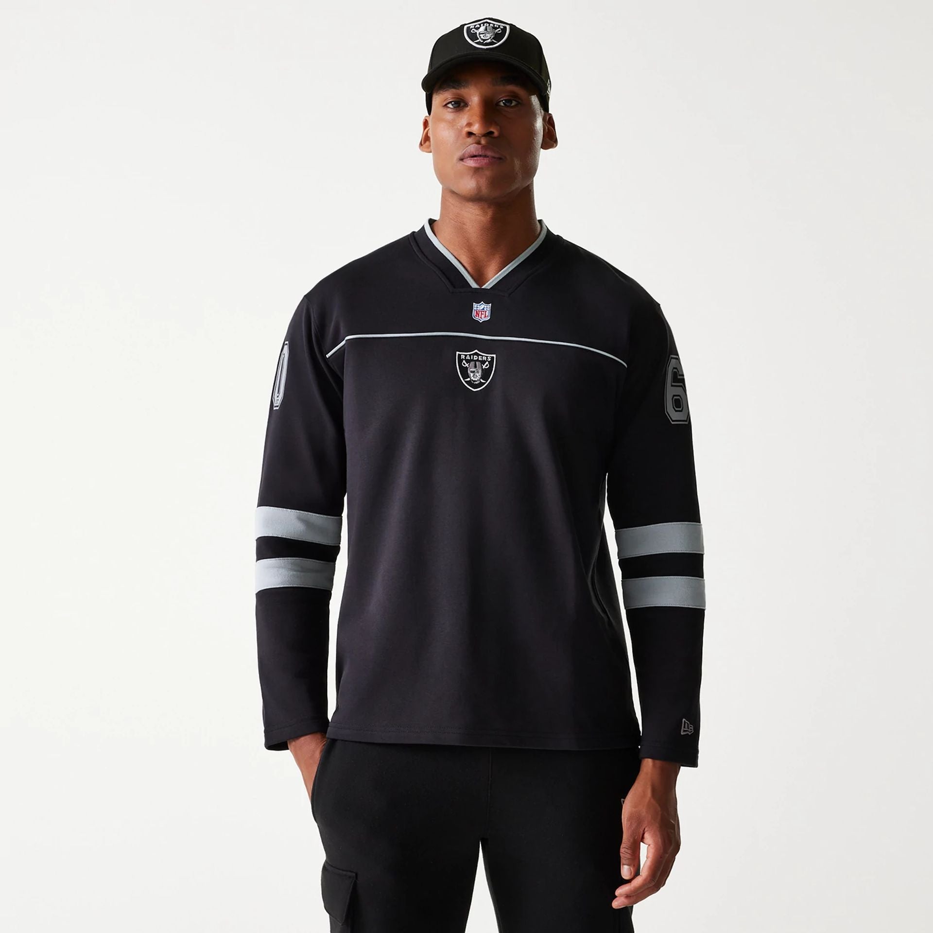 The Male model is wearing Las Vegas Raiders Korea Black Long Sleeve T-Shirt 1