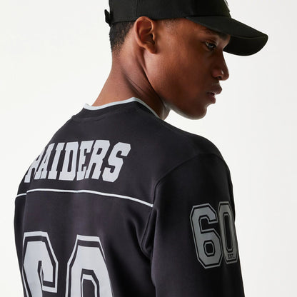 The Male model is wearing Las Vegas Raiders Korea Black Long Sleeve T-Shirt 6