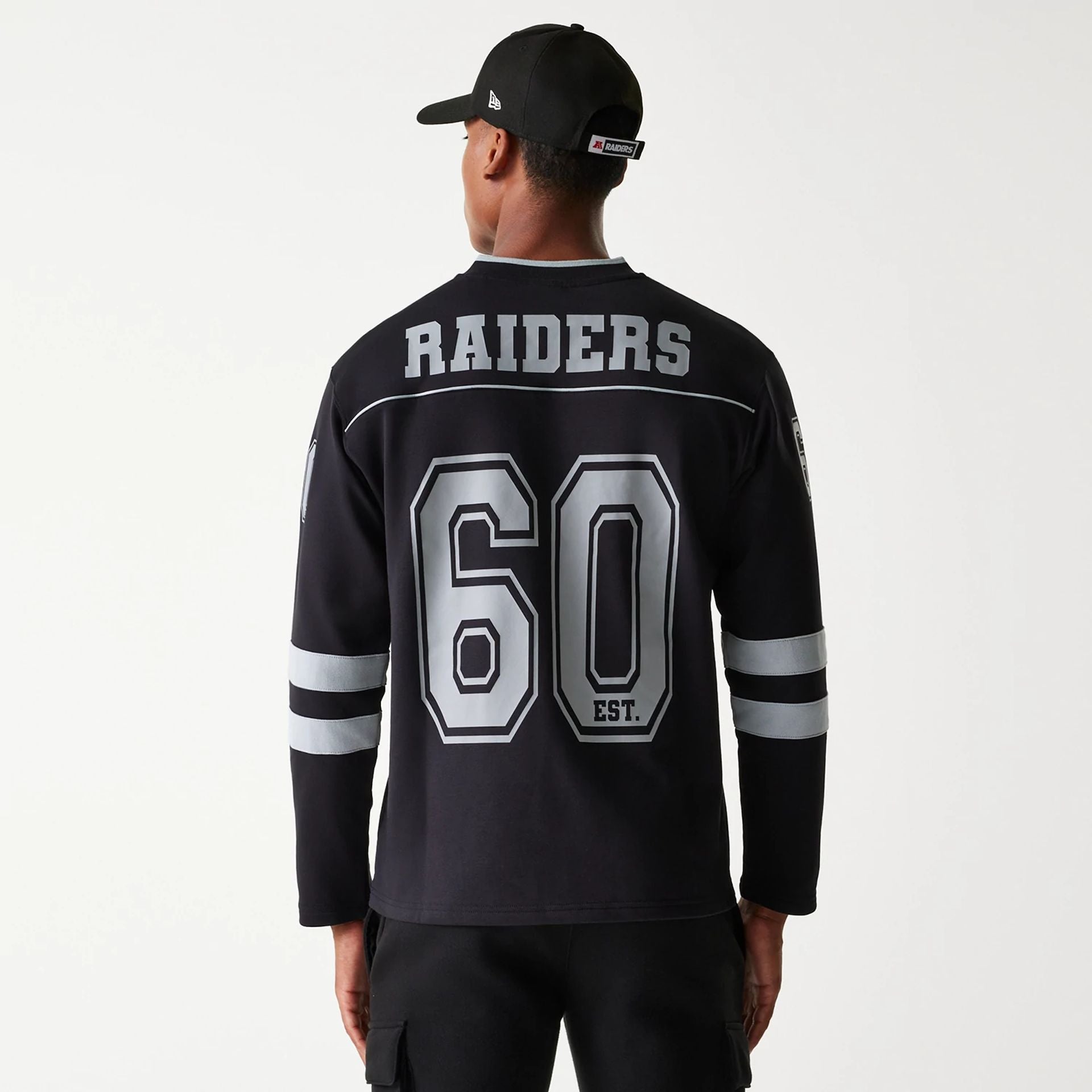 The Male model is wearing Las Vegas Raiders Korea Black Long Sleeve T-Shirt 2