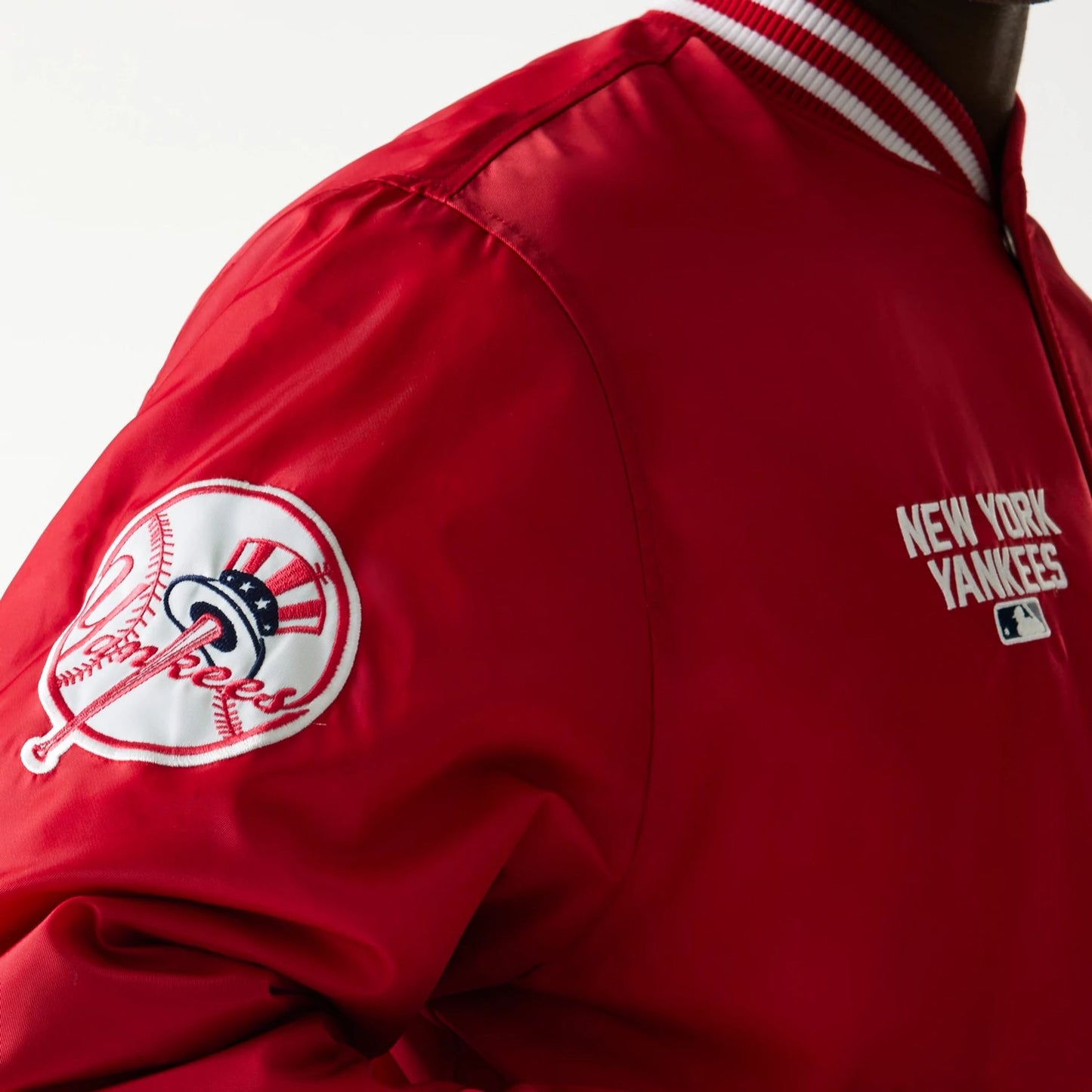 The Male model is wearing New York Yankees MLB Logo Stadium Red Jacket  4