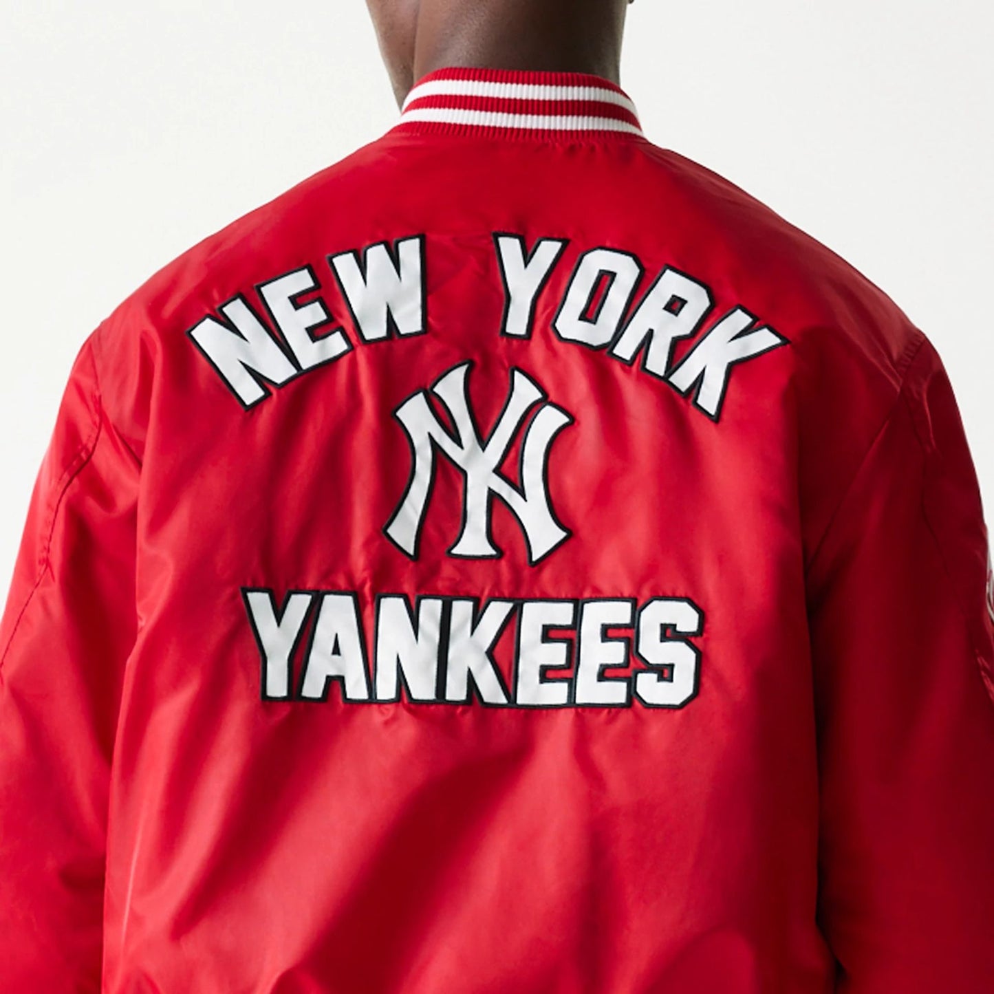 The Male model is wearing New York Yankees MLB Logo Stadium Red Jacket  7