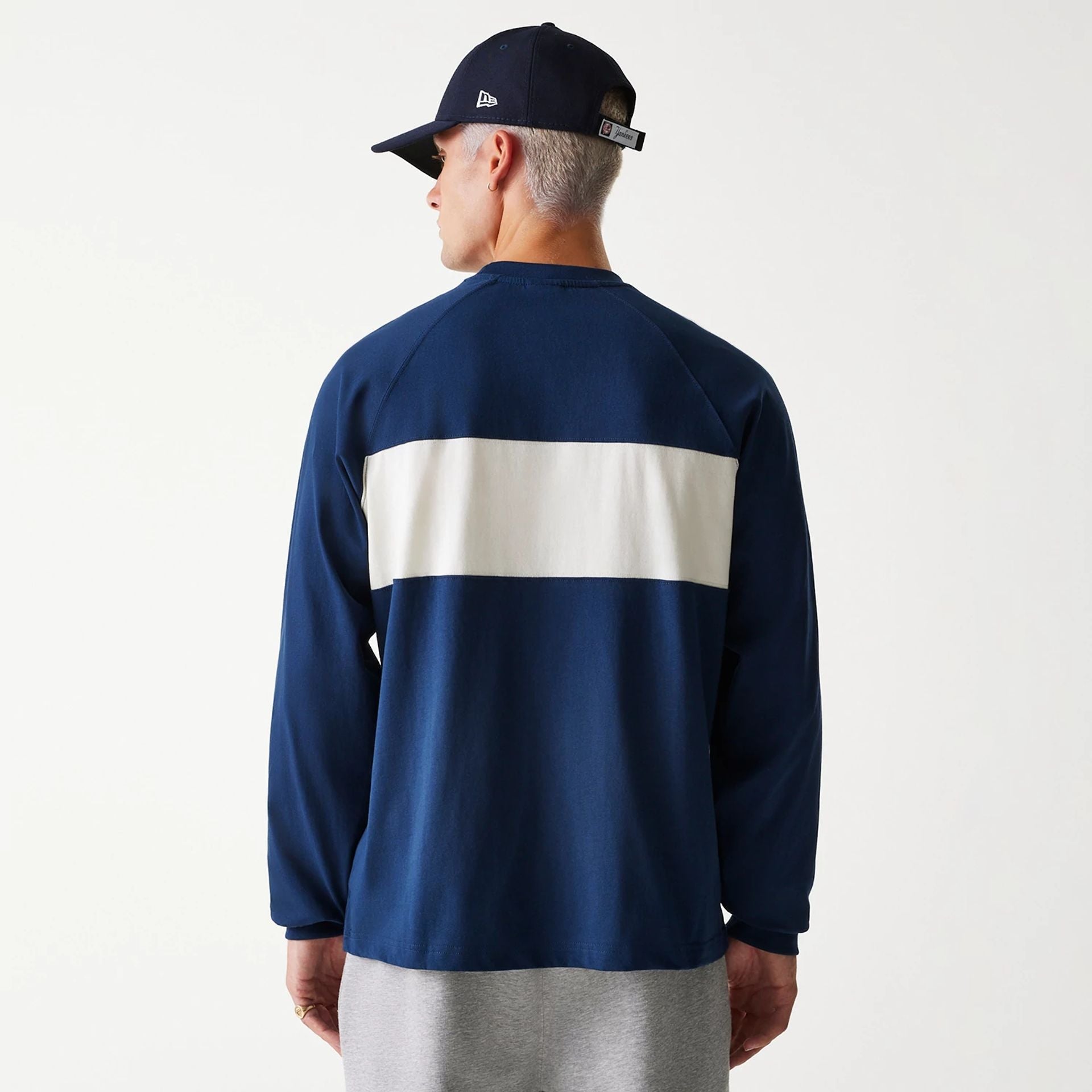 The Male model is wearing New York Yankees Korea Navy Long Sleeve T-Shirt 2