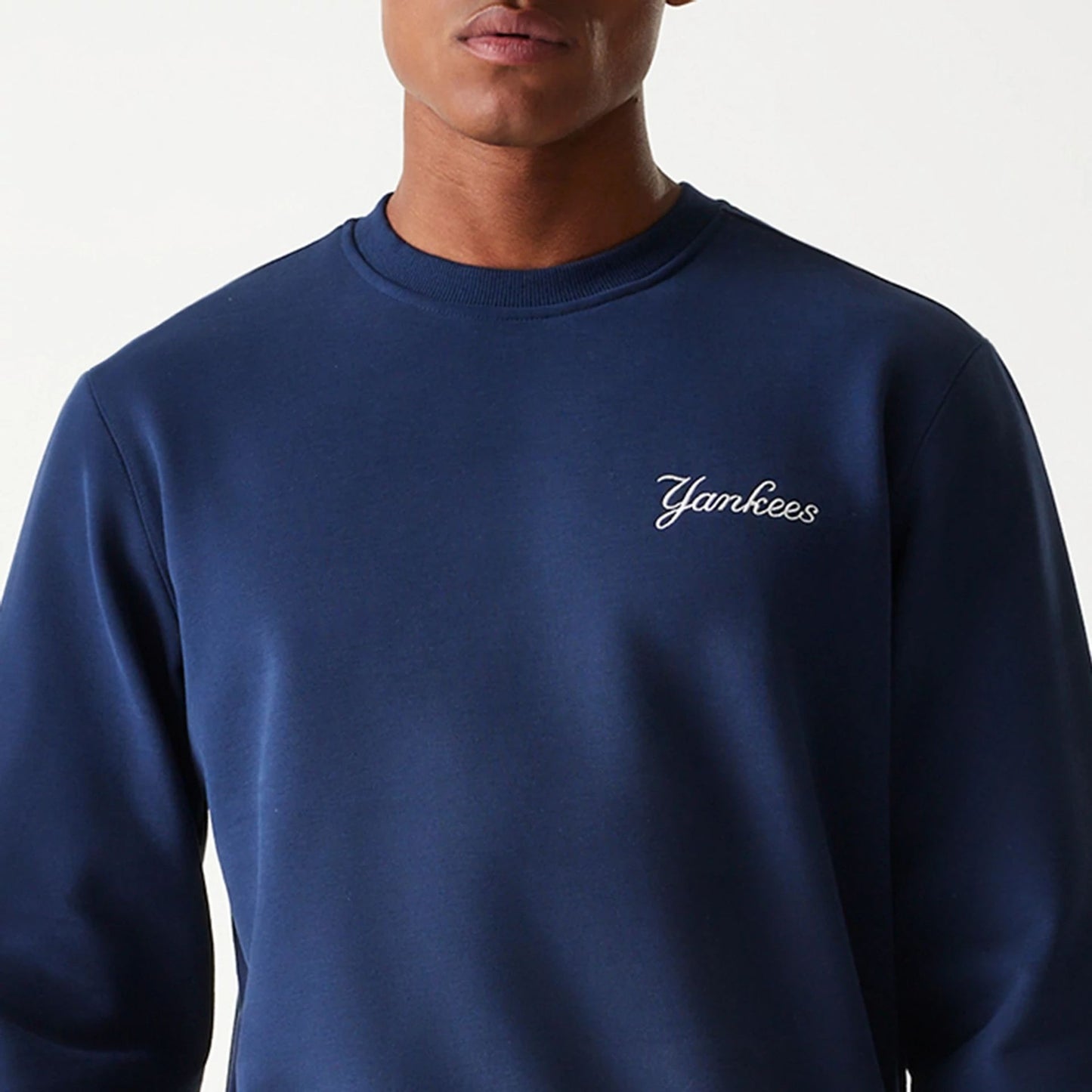 The Male model is wearing New York Yankees Korea Navy Sweatshirt 3