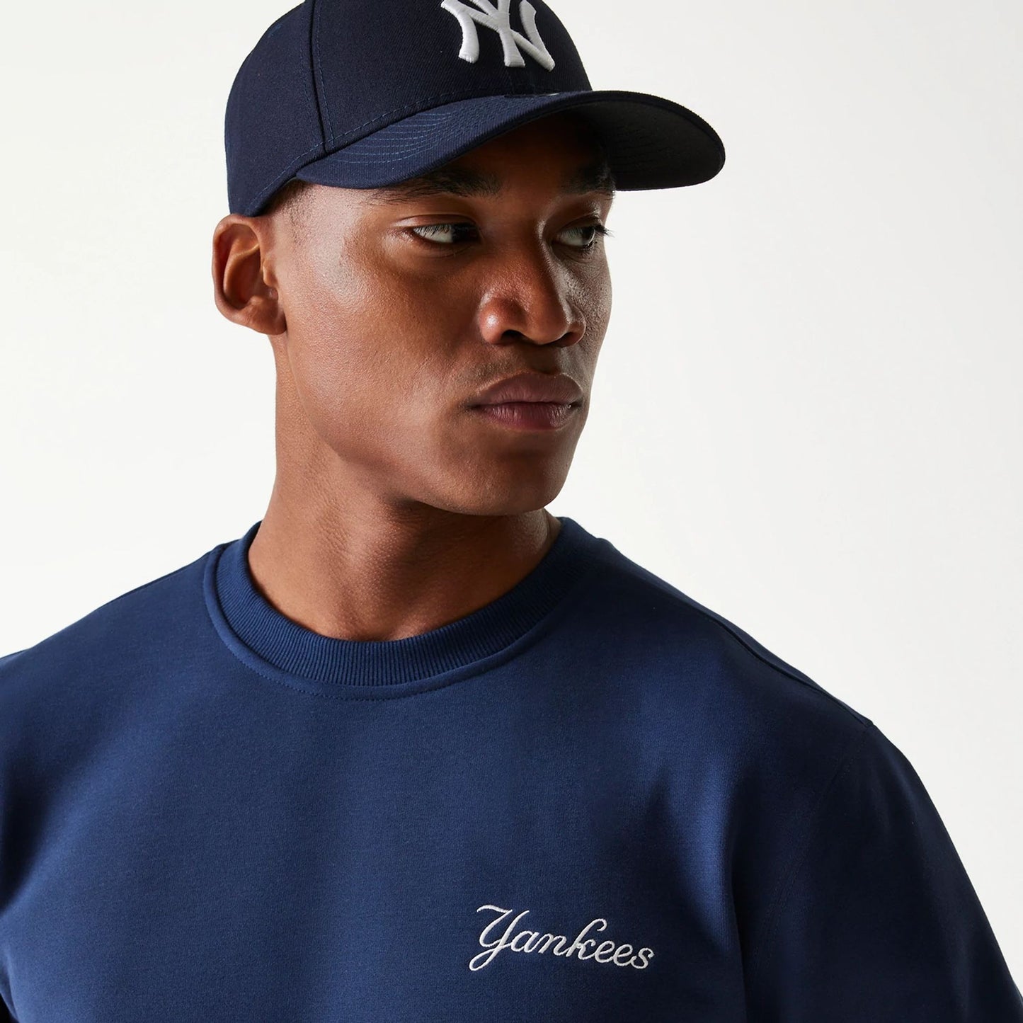 The Male model is wearing New York Yankees Korea Navy Sweatshirt 5