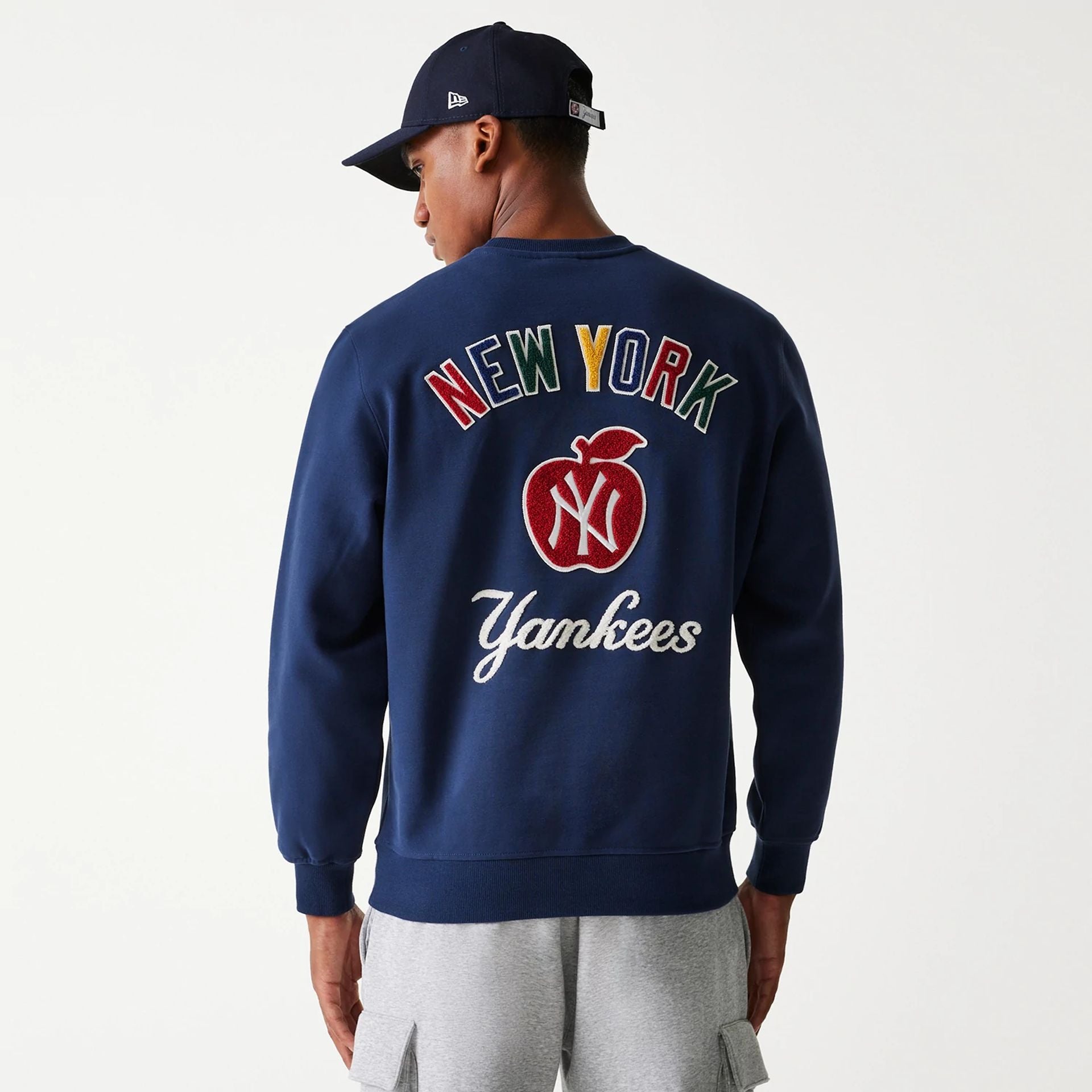 The Male model is wearing New York Yankees Korea Navy Sweatshirt 1