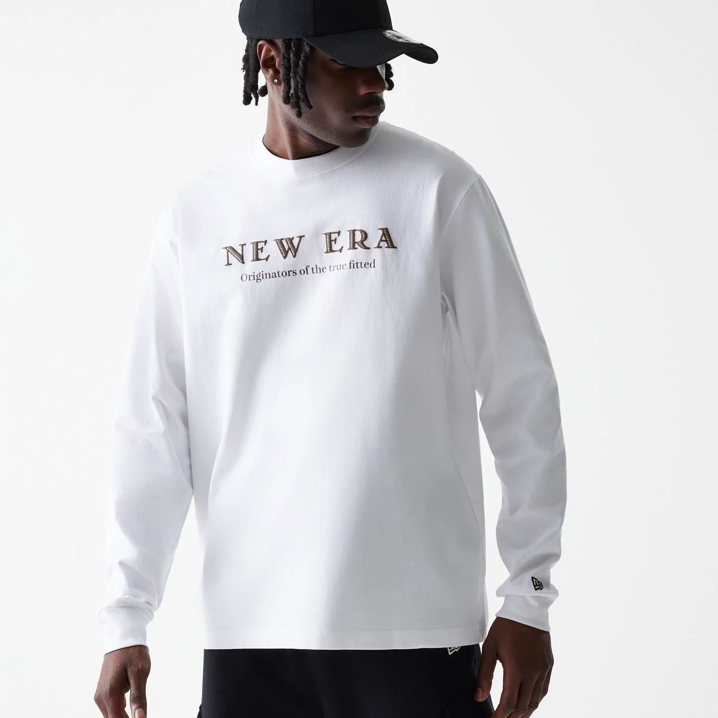 The Male model is wearing New Era Basic White Long Sleeve T-Shirt 6