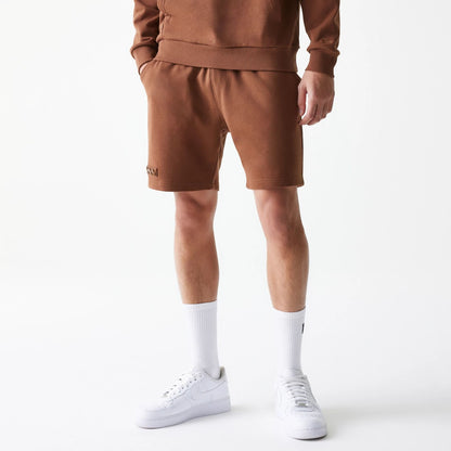 The Male model is wearing New Era Tonal Brown Shorts  7