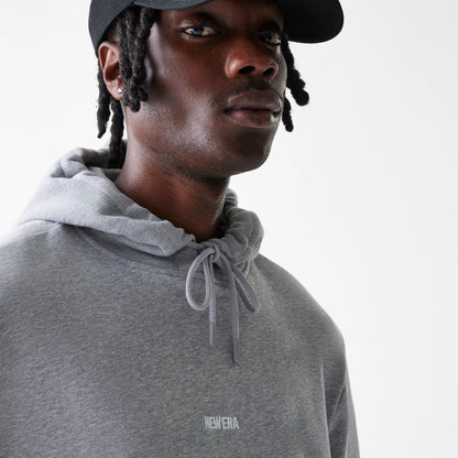 The Male model is wearing New Era Tonal Grey Pullover Hoodie  5