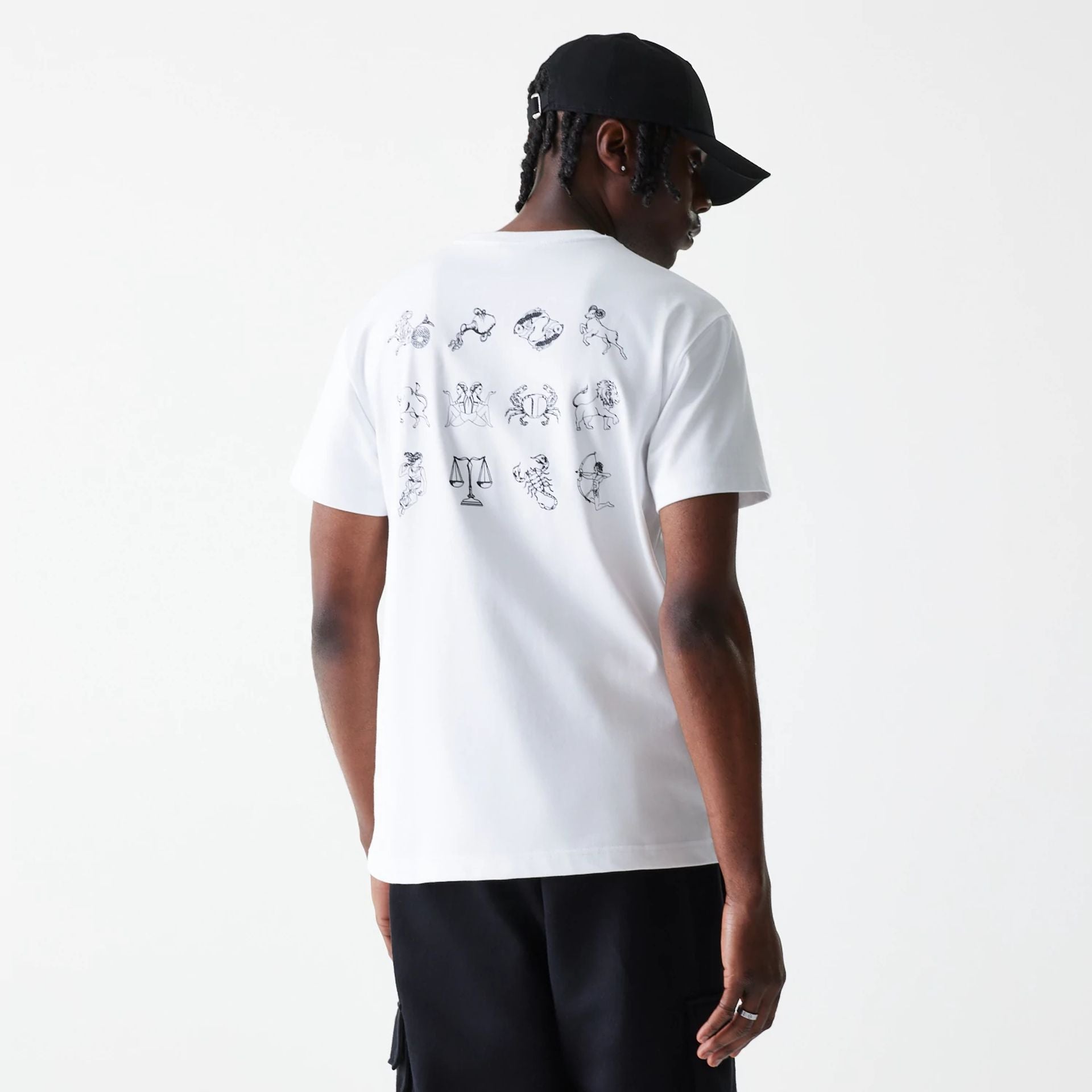 The Male model is wearing New Era Zodiac White T-Shirt 2