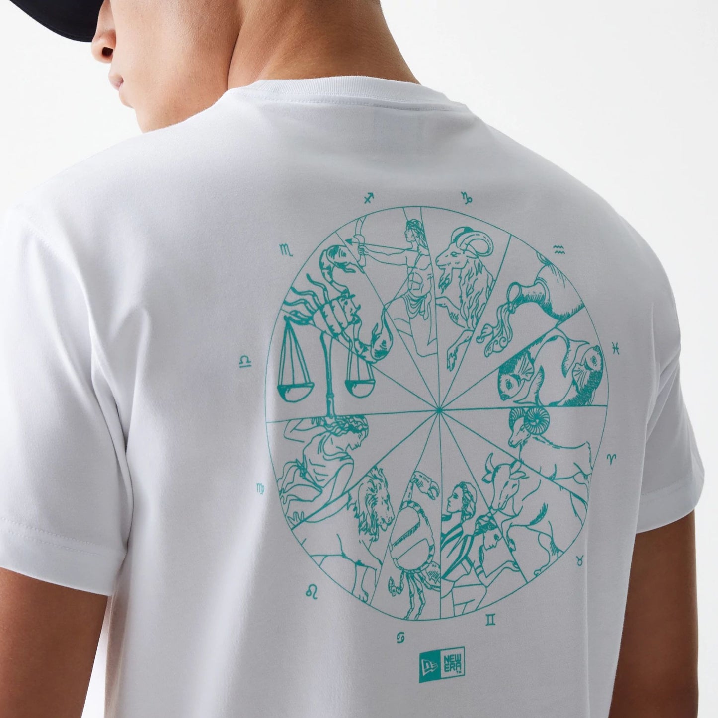 The Male model is wearing New Era Horoscope White T-Shirt 7