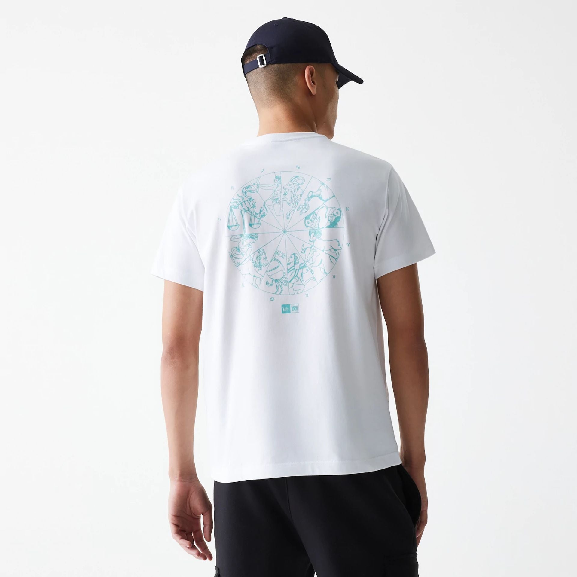 The Male model is wearing New Era Horoscope White T-Shirt 2