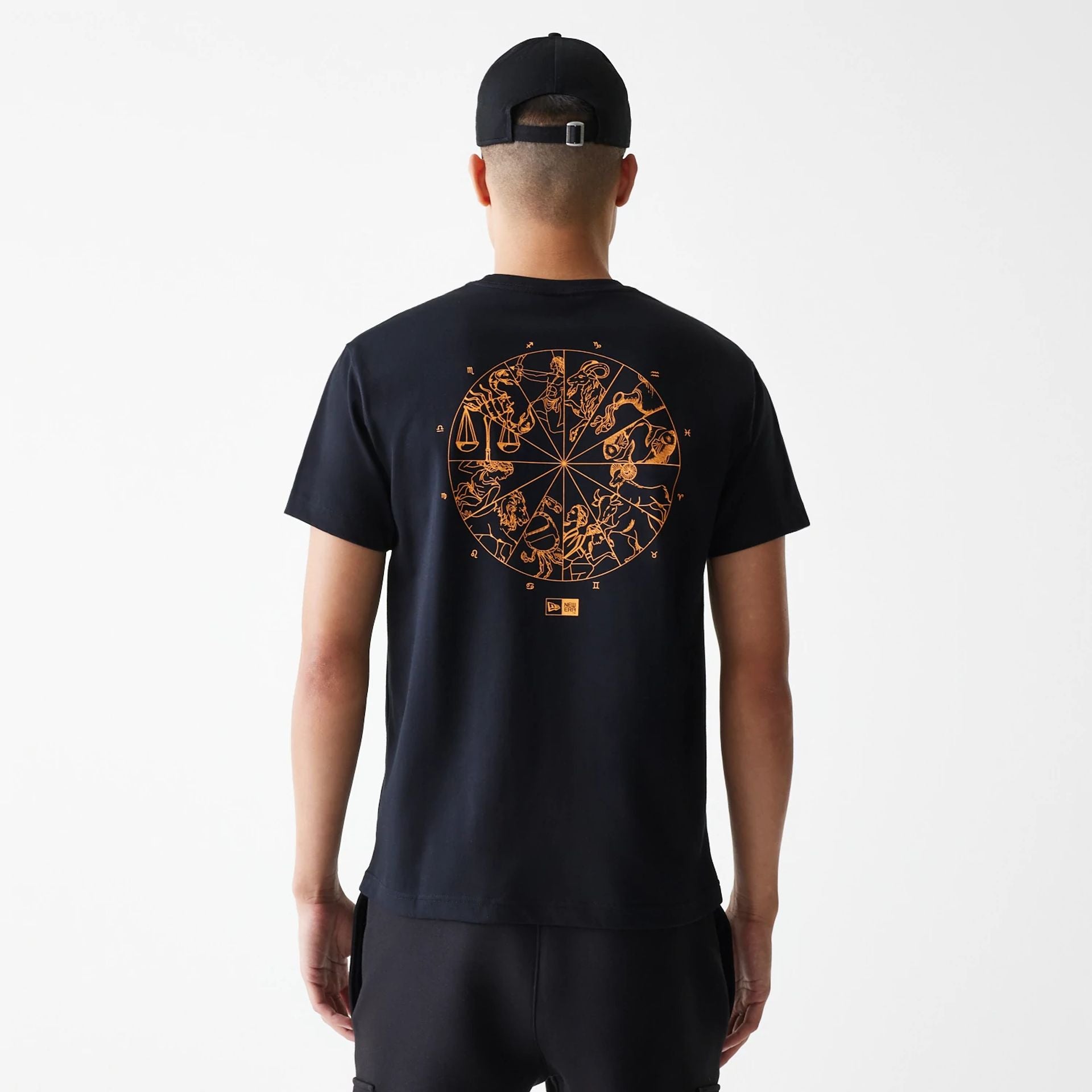 The Male model is wearing New Era Horoscope Black T-Shirt 2