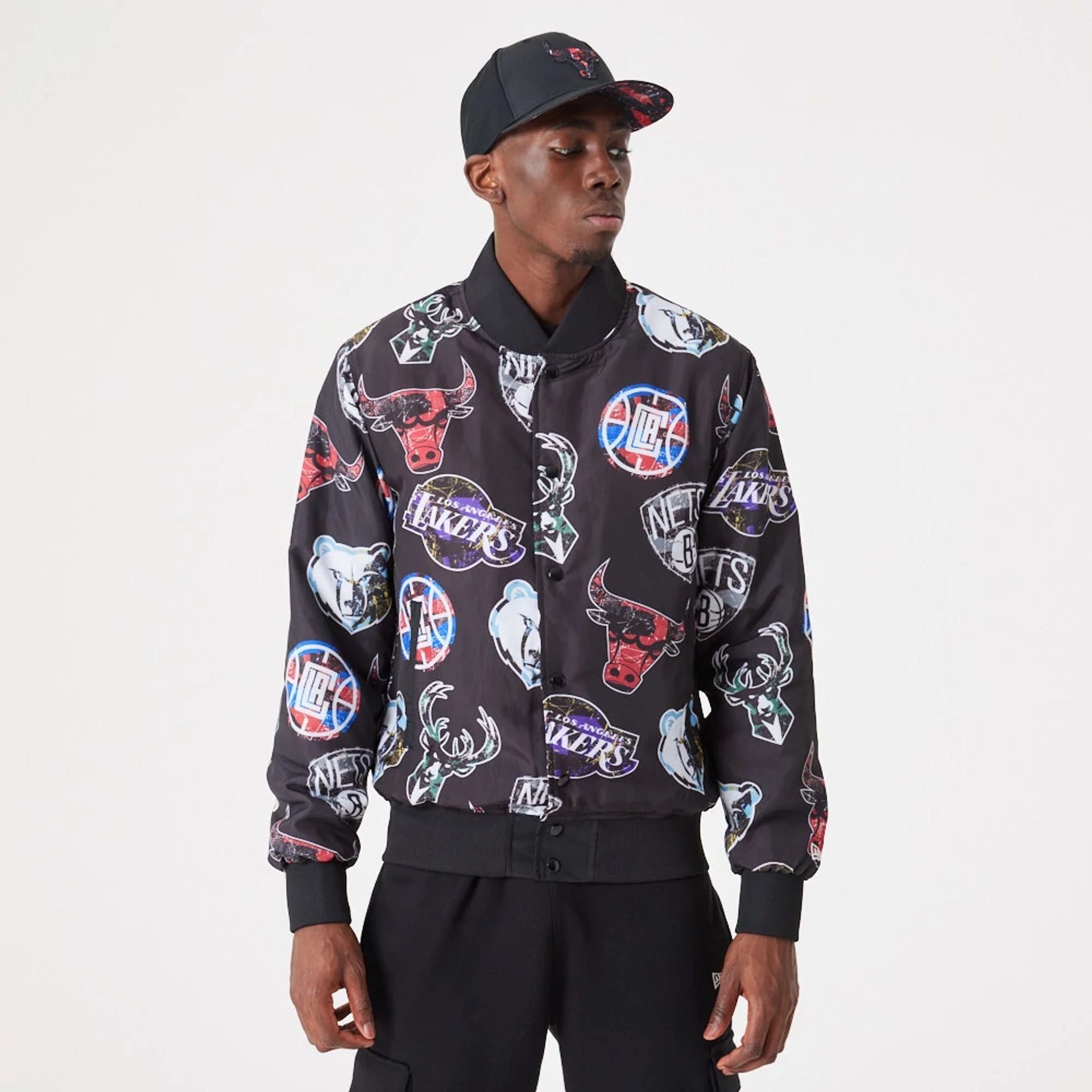 The Male model is wearing NBA All Over Print Team Logos Black Bomber Jacket 1